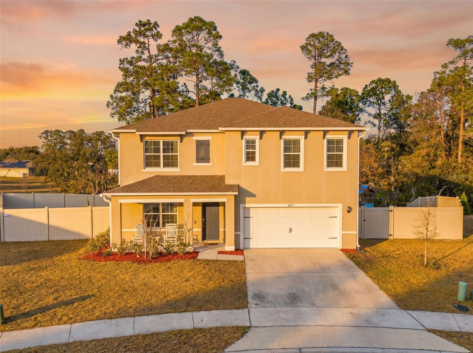 Welcome to this stunning 5-bedroom, 3-bathroom home located in the desirable Lake Gleason Reserve community of Deltona. Built in 2021 by D.R. Horton, this beautifully maintained two-story residence offers 2,601 square feet of thoughtfully designed living space with modern finishes and energy-efficient features throughout.Step inside to an inviting open-concept layout with high ceilings and abundant natural light. The spacious kitchen is the heart of the home, featuring granite countertops, stainless steel appliances, ample cabinetry, and a seamless flow into the dining and living areas—perfect for entertaining and everyday living. Tile flooring runs throughout the main living spaces, with comfortable carpeting in the bedrooms and loft area for added warmth and privacy.The flexible floor plan includes five generously sized bedrooms and a versatile loft space ideal for a media room, home office, or play area. Smart home technology adds convenience and peace of mind, while energy-efficient upgrades such as a fiberglass front door and double-pane windows help keep utility costs down.Step outside to enjoy the expansive fenced backyard, complete with a playground and plenty of room to host gatherings, pets, or future outdoor enhancements. Whether you're entertaining guests or enjoying a quiet evening at home, this outdoor space offers endless possibilities.Located in a growing area close to shopping, dining, and major roadways, this move-in ready home combines modern comfort with family-friendly living. Don’t miss your opportunity to own a nearly new home in Lake Gleason Reserve!