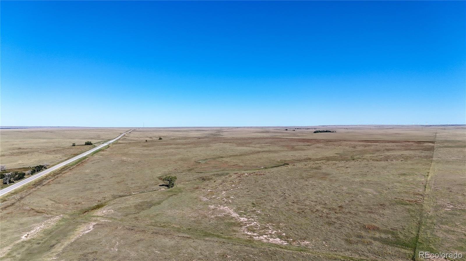 Eastern Colorado Ranch – 966.92 Acres | Lincoln County, CO | $677,000

Discover wide-open spaces and true Colorado ranching country on this 966.92± acre property in Lincoln County, just off Highway 40/287. Offering excellent access, a functional set of cattle improvements, and a unique highway underpass for safe livestock movement, this ranch is well-suited for both grazing and long-term investment.

The property features approximately 1,007 total acres, less 40 acres with a separate home, for a net of 966.92 acres included in the sale. A bridge located on Highway 40/287 provides convenient ingress and egress under the highway, allowing easy access to both sides of the property.

Water is supplied by an unregistered well with a windmill (to be registered by the seller) located at the corrals on the east side of the ranch near the highway. Fencing is 4-wire barbed and in functional condition throughout. The property is currently one large pasture with no cross-fencing, offering open grazing flexibility.

Improvements for cattle operations include a 1,920 sq. ft. barn and working corrals conveniently positioned near the well and highway. The land features gentle rolling grassland terrain typical of the eastern plains—ideal for a cow-calf or yearling operation, or as a base property to add to an existing ranch.

This is a rare opportunity to own a sizable, contiguous parcel with excellent access and solid infrastructure in Lincoln County, Colorado—all for $677,000.