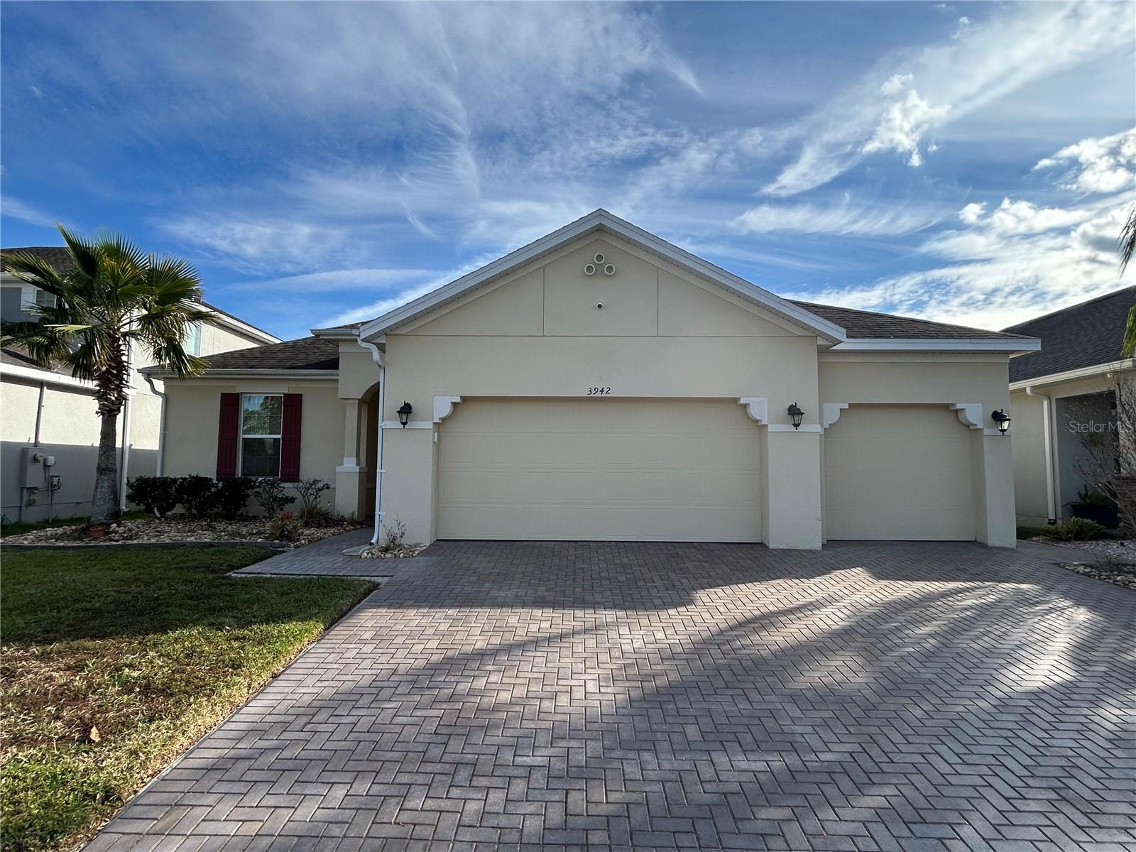 Virtually Staged. Location, space and style come together in this impressive 4-bedroom, 3-bath home in Reserve at Sawgrass.  Offering 2,753 square feet of living space, this beautiful home is ideally located just minutes from Lake Nona, Orlando International Airport, major highways, shopping, dining, and more.  Inside, you'll find an open-concept layout featuring a formal dining room, a modern kitchen with an oversized granite island, and a spacious living area that flows seamlessly to a screened-in paver patio, creating the perfect setting for entertaining family and friends.  The primary suite offers a spacious retreat with a large en-suite bathroom and walk-in closet, while the additional bedrooms provide plenty of room for family, guests, or hobbies.  A versatile nook adjacent to the kitchen serves as an ideal home office, study area, or flex space.  Outside, enjoy added privacy with a fully fenced backyard.  Schedule your private showing today and discover all that this exceptional home has to offer!