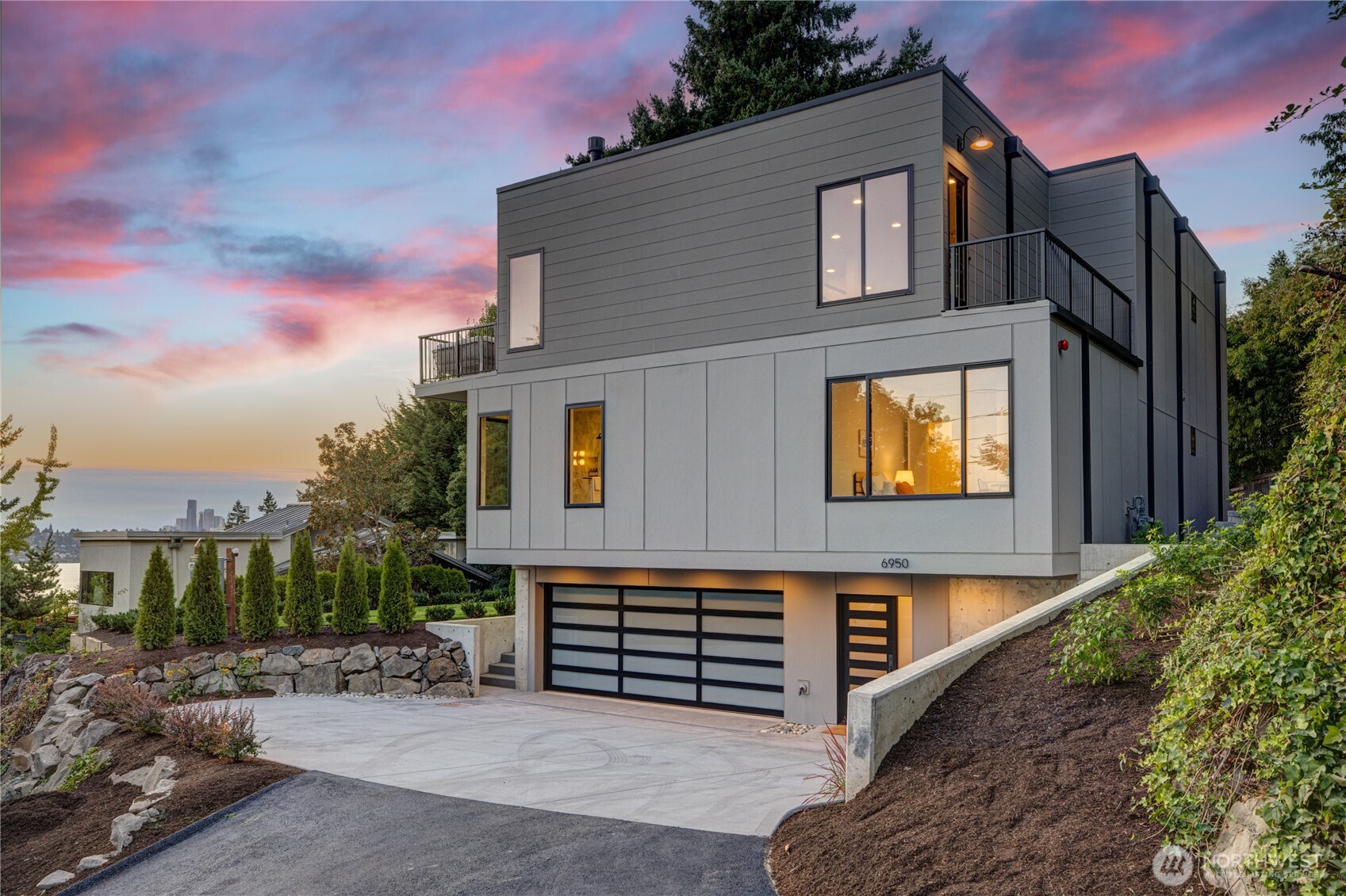 Experience refined Northwest living in this stunning new construction by RKK Construction, located in the highly sought-after First Hill neighborhood. Western-facing views capture sunsets over the lake, mountains, and city skyline, creating a dramatic backdrop to everyday living. Designed with intention, the open great room connects effortlessly to generous outdoor spaces, while four bedrooms on one level offer both comfort and convenience. A private office, fully equipped ADU with separate entrance, and a residential elevator servicing all three floors add versatility and ease. With exceptional craftsmanship and a premier north-end location near parks, schools, and downtown Mercer Island, this home is a rare opportunity.