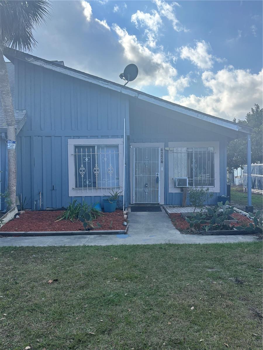 Great opportunity to own a home in Orlando! This two bedroom home is tiled throughout, with a Dining Room Living Room combo, new sliding glass door that lead to a private back yard, updated bathroom and conveniently located near I-4 and shopping. Some TLC will make this a great home. The neighborhood is undergoing beautification which makes it a great investment. Schedule your appointment to see this home soon.