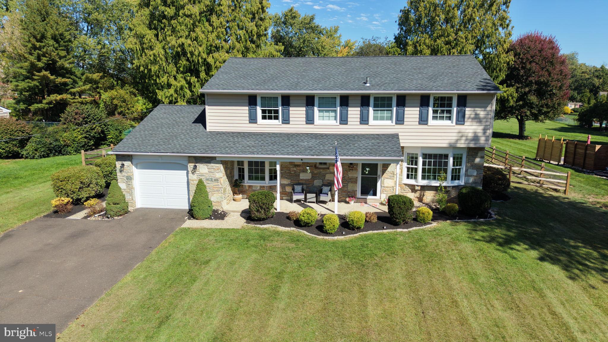 Location, location, location! Welcome to this beautifully maintained Colonial in the highly desirable Orchard Hill community, in Council Rock School District. Situated on one of the neighborhoods most desirable cul-de-sac streets, this 4 bedrooms, 2-1/2 bathroom home features  thoughtful improvements, including hardwood flooring throughout much of the home. A welcoming covered porch opens to the center hall foyer, highlighted by a graceful turned staircase. The spacious living room is filled with natural light from a large front bay window, while glass French doors provide lovely views and access to the fenced-in backyard. Across the foyer, the formal dining room offers hardwood flooring and another beautiful bay window, creating an ideal setting for gatherings and special occasions. The eat-in-kitchen opens to the nicely sized family room, where exposed ceiling beams, inlaid hardwood flooring, and a striking stone fireplace create a warm and comfortable atmosphere. Convenient access to the 3 season sunporch from both the family room and the mudroom, makes indoor-outdoor living effortless. Upstairs the primary bedroom features hardwood flooring, a sitting area, a walk-in closet and a private ensuite bath. Three additional generously sized bedrooms, also with hardwood flooring, share a hallway bathroom. One of this home’s most appealing features is its exceptionally spacious backyard, framed by mature trees and backing to peaceful open space and township park-land. Whether enjoying a quiet morning on the enclosed sunporch or entertaining family and friends, the setting offers a wonderful sense of privacy and tranquility. Close to walking trails, parks, shopping, restaurants and regional rail service to Center City. A wonderful opportunity awaits.