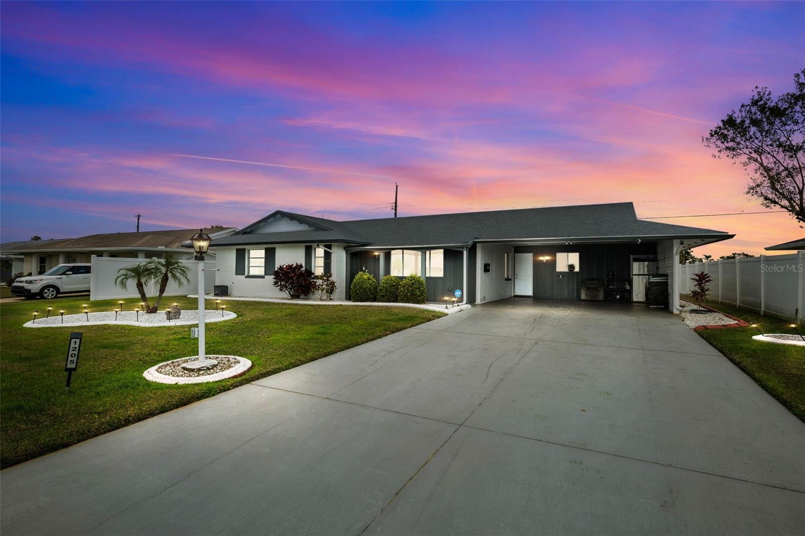 What a deal!!! SUN CITY CENTER. NO MONTHLY HOA! Only master association for amenities $330 per person, per year. 2 LARGE BEDROOMS 2 FULL BATHS. No backyard neighbors! 2 car covered carport and HUGE attached storage shed. BRAND NEW ROOF INSTALLED PRIOR TO CLOSING!! A large Air conditioned Florida room/office or den. REMODELED home features LVP Flooring throughout. Gorgeous kitchen w/quartz with stylish TONS of White Cabinets & Quartz counters and a large seated island. Sliders lead out to your Florida Room that is currently being used as an office. Both bathrooms have been updated! The SPRAWLING Living room features a stunning marble tile accent wall!