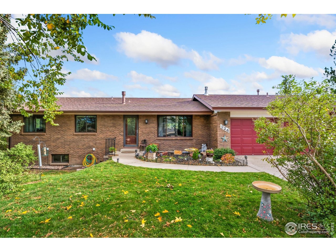 If you've been dreaming of space, privacy, and peaceful surroundings without giving up convenience of being minutes from Old Town and shopping, this beautifully maintained ranch-style home offers exactly that. From the moment you arrive, the mature setting and inviting curb appeal set the tone. Inside, bright, airy spaces, rich hardwood floors, and serene views create a warm atmosphere that effortlessly brings the outdoors in.The main level features an updated eat-in kitchen with generous cabinet space and a gas range, a comfortable family room with a cozy gas fireplace, and a primary suite with a thoughtfully updated private bath. Two additional bedrooms and an updated full bath complete the main floor. The walkout basement provides exceptional flexibility, offering a large great room anchored by a top-of-the-line wood-burning stove, an oversized bedroom, an updated bath, and a dedicated storage room - ideal for guests, hobbies, or multi- generational living. Improvements provide peace of mind, including a NEW 50-year roof, dual heating systems, central air conditioning, and energy-efficient Renewal by Andersen windows. Set on .67 acres, the outdoor living is just as impressive. Raised garden beds with sprinkler and drip systems make growing simple, while a large storage shed offers plenty of space for tools and equipment. The oversized heated garage is perfect for projects and tinkering year-round. Enjoy breathtaking sunrises from the expansive main deck, or unwind in the gazebo on the separate deck while taking in the quiet surroundings and frequent wildlife visits. Nature lovers will appreciate being just minutes from Douglas Lake Reservoir for fishing and outdoor recreation. And best of all - no HOA. This is the rare blend of rural tranquility and city convenience you've been waiting for.