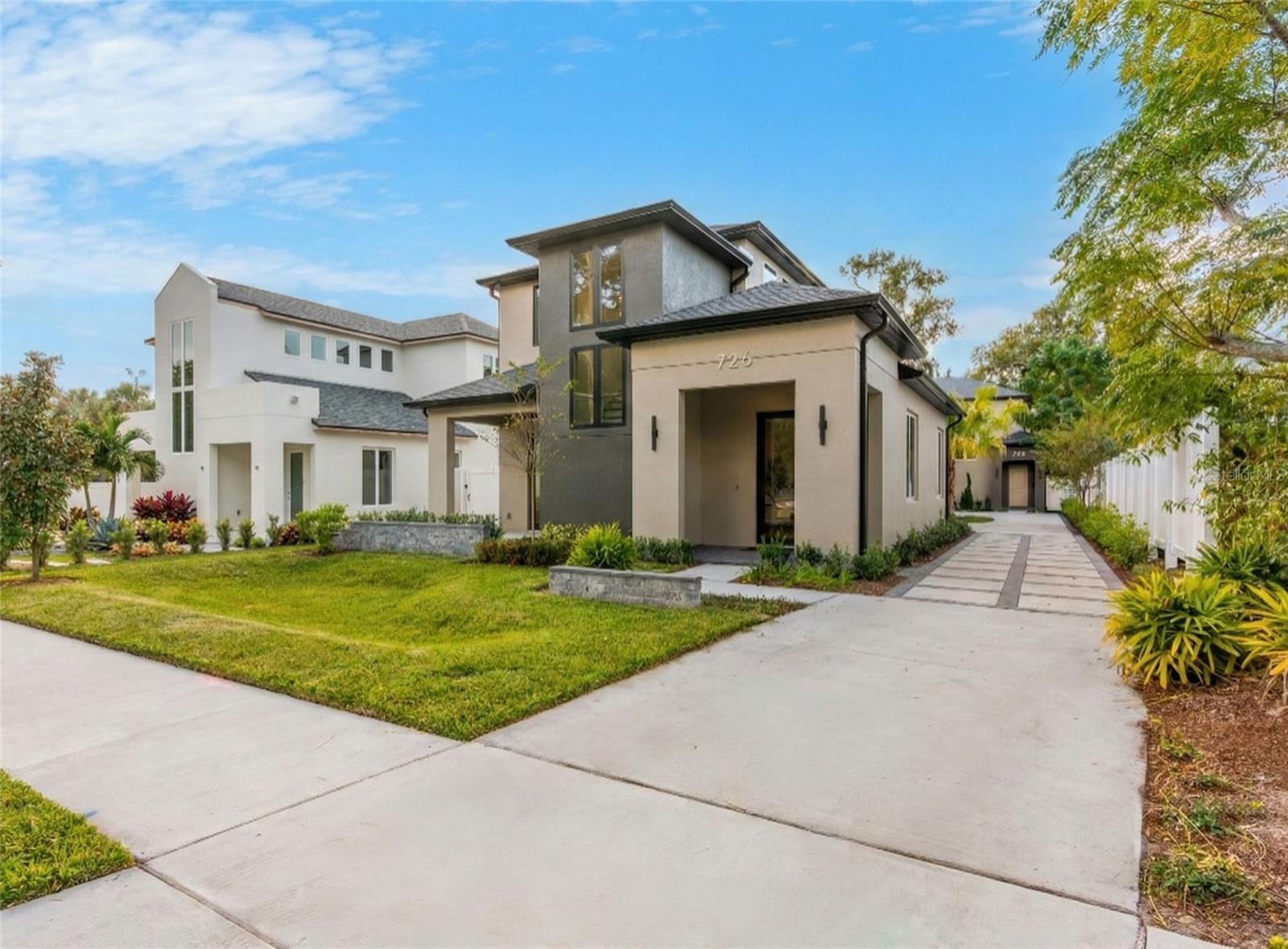 Priced below a January 2026 appraisal, this tandem lot home enters the market with instant equity. Start and end your days in a home that feels effortlessly modern and deeply connected to Orlando’s best urban lifestyle. This new 3-bedroom, 2.5-bath residence offers beautifully designed living space with high ceilings, luxe finishes, and a low-maintenance lock-and-leave layout.Step inside to discover an open floor plan that blends style with function, a kitchen lined with abundant shaker cabinetry, quartz counters, and designer lighting, flowing seamlessly to the dining area and covered patio for easy entertaining. The great room’s clean lines and natural light set the tone for relaxed, modern living.Upstairs, the spacious primary suite is a true retreat with a coffered ceiling, dual closets, and a spa-inspired bath featuring double vanities and a walk-in shower. Storage is thoughtfully placed throughout, including a generous pantry and two-car garage.Located minutes from Downtown Orlando, College Park, and the vibrant Packing District with favorites like Great Southern Box Food Hall, High Point Rock Climbing, and Dougie’s Dog Bar just around the corner. Enjoy weekends at the nearby YMCA, local tennis courts, or catching a Magic game at the Kia Center.Set within the sought-after College Park community, known for its tree-lined streets, neighborhood charm, and close-knit feel, this home offers a rare blend of modern design and timeless Orlando appeal.