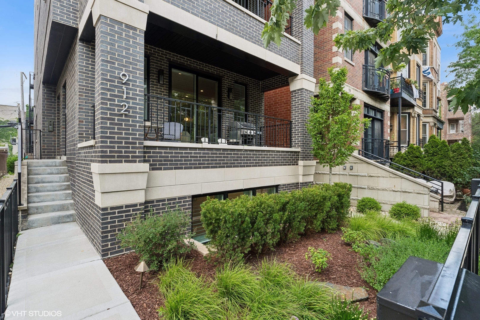 If you are looking for new construction but don't want to wait, this newly built in 2022, 4 bedroom duplex down in Nettelhorst School District is it! The unit is sprawling, near 3000 square feet 4 bedroom, 3.1 bath condo that lives like a single family with 3 private outdoor spaces includes a Huge private Roof Deck with custom built pergola over a 3 car garage, a private brick paver patio/backyard area plus a covered deck off the front living room. You'll enjoy Luxury amenities abound including a true chef's kitchen with professional grade appliances like Wolf/Subzero, custom cabinetry, quartz counter tops plus enormous entertaining island with overhang for barstools, custom lighting, incredible professionally organized walk-in pantry & an eat-in breakfast area that all opens into the large back family room. Natural light pours in the back room where you'll enjoy a gorgeous built-in media system, integrated fireplace, and steps down to a mudroom area to access your back patio and garage. Further down to the home's lower level, you'll find full radiant Heated floors  with the coveted layout of 4 Bedrooms on the same level, full size side-by-side laundry & 3 Full Spa inspired bathrooms with Grohe fixtures, marble, quartz and custom cabinetry. The luxurious primary suite offers multiple organized closets, custom window treatments, and the ensuite bath that features steam shower + separate soaking tub + dual sink vanity.   Throughout the home you'll find 5" wide plank White Oak flooring, custom crown/base millwork, Sound Attenuation technology including concrete between unit floors, high efficiency HVAC/tankless water heater.  Bonus - and enormous crawl storage space on lower level for seasonal decoration, suit cases OR could be a darling play space! 1 Garage Parking space Included!  Come see for yourself what elevated living in Prime Lakeview location looks like - on a quiet 1 way street all steps to Broadway shops and restaurants, Halsted, Clark/Wrigley.