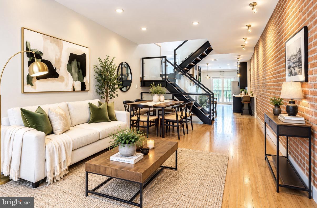 Welcome to 3208 Elliott Street, where timeless Canton charm meets over $150,000 in thoughtful upgrades including a Tesla charger in one of the most desirable locations Baltimore has to offer.Inside, this exceptionally unique home immediately captivates with soaring dramatic ceiling heights, stunning exposed brick, and a staircase so striking it feels like a piece of modern art. Natural light pours through the home, illuminating every level and creating an inviting, airy atmosphere throughout.Perfectly positioned just moments from Canton Waterfront, Canton Square, the waterfront promenade, Canton Crossing, Patterson Park, countless restaurants, coffee shops, fitness studios, and entertainment options, this is city living at its absolute finest. Residents enjoy the rare ability to leave the car behind and walk to virtually everything that makes Canton one of Baltimore's most sought-after neighborhoods. The Canton Waterfront offers stunning harbor views, waterfront trails, festivals, concerts, water taxi access, and endless opportunities to enjoy the outdoors.The current owner has invested more than $150,000 in upgrades, leaving no detail overlooked. Major improvements include a beautifully renovated kitchen, updated bathrooms, newer roof, HVAC system, doors, and numerous additional enhancements that provide both style and peace of mind for years to come.The spacious floor plan offers three generously sized bedrooms, each filled with natural light and designed for comfortable everyday living. The combination of historic character and modern updates creates a truly special home that stands out from anything else on the market.Rounding out this incredible opportunity is one of Canton's most coveted features—off-street parking. In a neighborhood where parking is often at a premium, having your own dedicated parking space adds exceptional convenience and value. Local residents consistently cite walkability and parking as some of the most important features of Canton living, making this home a rare find.If you've been waiting for a home that perfectly combines location, uniqueness, modern updates, natural light, and parking, your search ends here. 3208 Elliott Street is the complete Canton package.