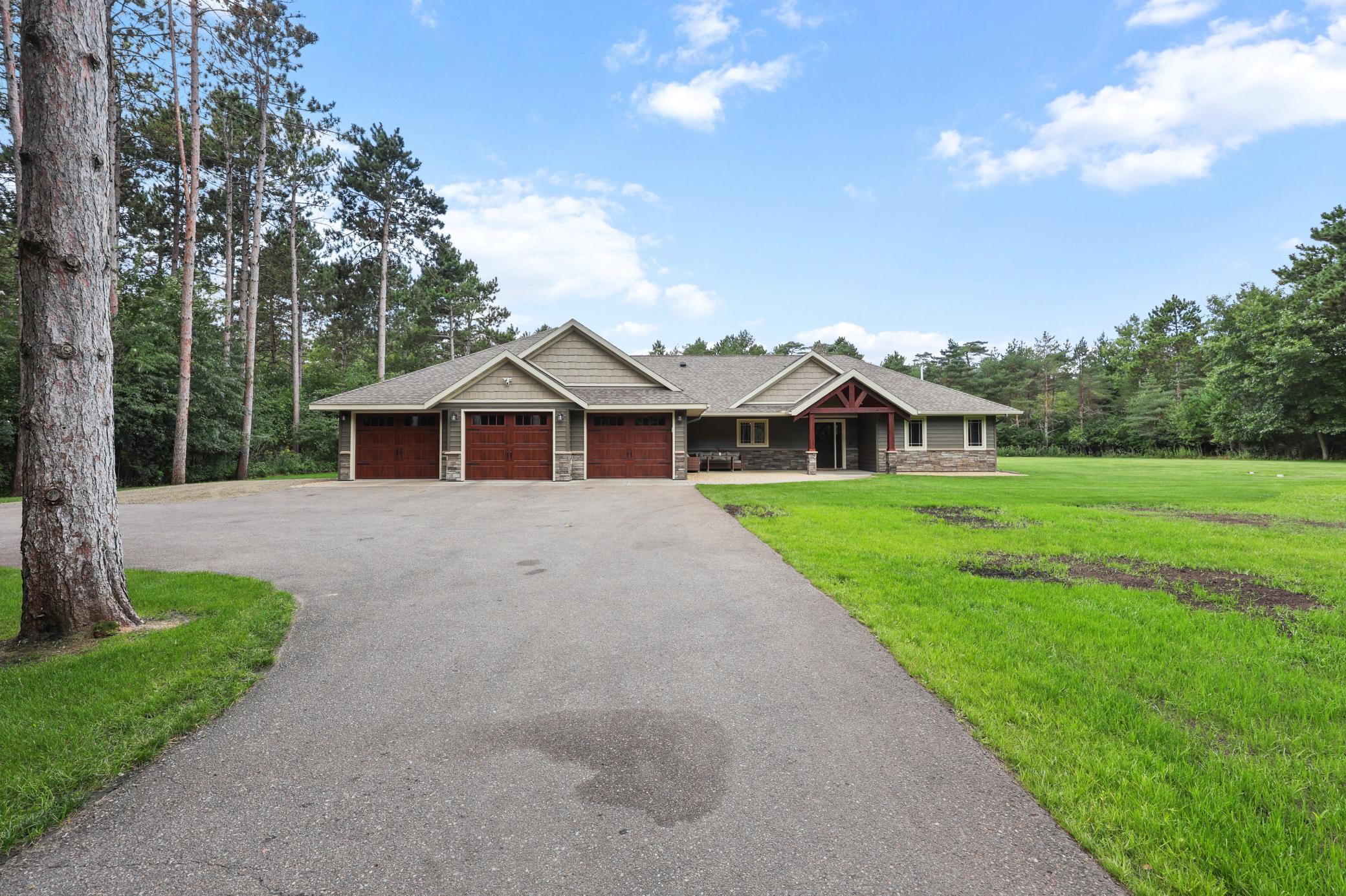 Welcome to 12987 Hilton Rd, a beautifully maintained 3-bedroom, 3-bathroom patio home offering quality construction, thoughtful design, and an exceptional setting just minutes from the Mississippi River and Zebulon Lake. Nestled on 1.5 beautifully manicured acres, this property offers the privacy and peacefulness of a country setting while maintaining convenient access to Little Falls, Highway 10, area golf courses, fishing, and recreation.Inside, the home features a bright, open-concept floor plan with quality finishes throughout and an inviting flow between the living, dining, and kitchen areas. The spacious primary suite is a true retreat, featuring beautiful views overlooking the wooded landscape beyond the backyard and generous walk-in closet space. The additional bedrooms and bathrooms provide plenty of room for family, guests, or a home office.Outside, the meticulously maintained grounds are a standout feature, with an irrigated lawn and plenty of space to enjoy the peaceful surroundings. The large 3-stall heated garage measures approximately 26' x 36' and offers the depth and flexibility needed for larger vehicles, recreational equipment, toys, or additional storage.The location is hard to beat. Enjoy quick access to the Mississippi River and Zebulon Lake, a roughly 9-mile stretch of water offering excellent opportunities for fishing, boating, and recreation. Several area golf courses are just minutes away, while convenient Highway 10 access makes commuting south or into Little Falls simple.If you're looking for a high-quality home that combines comfortable one-level living, beautiful grounds, an oversized heated garage, and a peaceful location close to some of Central Minnesota's best outdoor recreation, 12987 Hilton Rd is one you won't want to miss.
