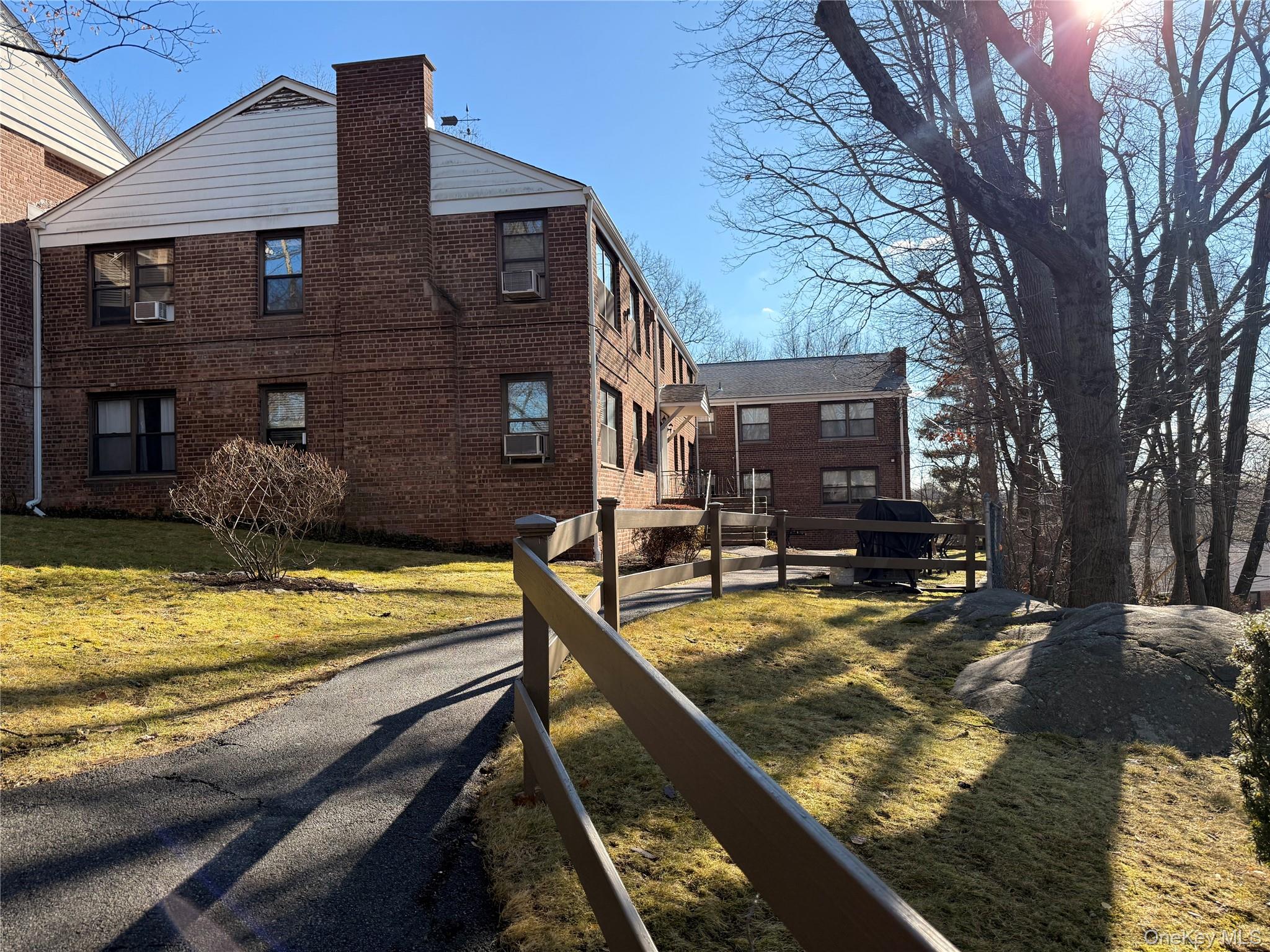 Welcome to Country Club Ridge! A beautiful, bright and renovated 2 BR plus den/office/bedroom just steps from the quaint Hartsdale village and Train. A commuter's deliight with a 35 minute ride to Grand Central! This garden-style co-op communiity provides easy living  with pool. playground and gardens. The open dining foyer overlooks the living room where large windows bring in light and  the hardwood floors shine! The renovated kitchen include stainless steel appliances and beautiful counter tops and cabinetry to the ceiling! You will also appreciate the renovated bath and good closet apace.  Oh, the heat and hot water are included making it an affordable living option. The work has been done for you, so move right in! Note the outdoor space includes a patio area for the building. Look for the red BBQ grill and see where you can hone your craft this summer!