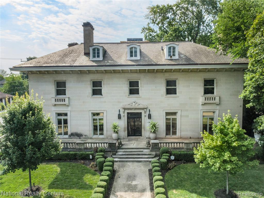 This historic masterpiece is truly one of Detroit's architectural treasures.

Exceptional Italian Renaissance Mansion & Carriage House designed by famed architect Louis Kamper and built in 1914 for yachtsman and lumber baron Charles W. Kotcher. A rare offering in Detroit’s exclusive Arden Park, this masterfully preserved three-story limestone estate has undergone over $700K in recent updates. Distinguished by its original circular drive for horse-drawn carriages, the residence rests on .41 acres of lush, landscaped grounds.

Architectural highlights include a soaring ornamental plaster Grand Hall ceiling, an impressive Grand Staircase with carved acorn finials, and a breathtaking two-story stained-glass windowed landing; 5 hand-carved marble fireplaces; a gilded plaster coffered dining room ceiling; graceful stone archways; a luminous sunroom/conservatory and a magnificent ballroom with stained-glass skylight, parquet flooring, band alcove area and lots of alcove storage closets.  Rich wood paneling and intricate built-ins in multiple wood species showcase the home's timeless craftsmanship.   

The Property also includes a  3-car side entry heated garage and a remarkable carriage house, both connected by a well-lit tunnel.  The carriage house features a full kitchen, living area, two bedrooms, a full bath, and a laundry room.   

Enjoy Detroit’s vibrant restaurants, world-class theatres, and premier sports venues, all just minutes away. The estate offers easy access to Henry Ford Health System, Wayne State University, and Detroit’s Cultural Center. With convenient connections to I-75, I-94, and US-10, and just a 30-minute drive to Detroit Metro Airport, this location combines historic elegance with unmatched accessibility.