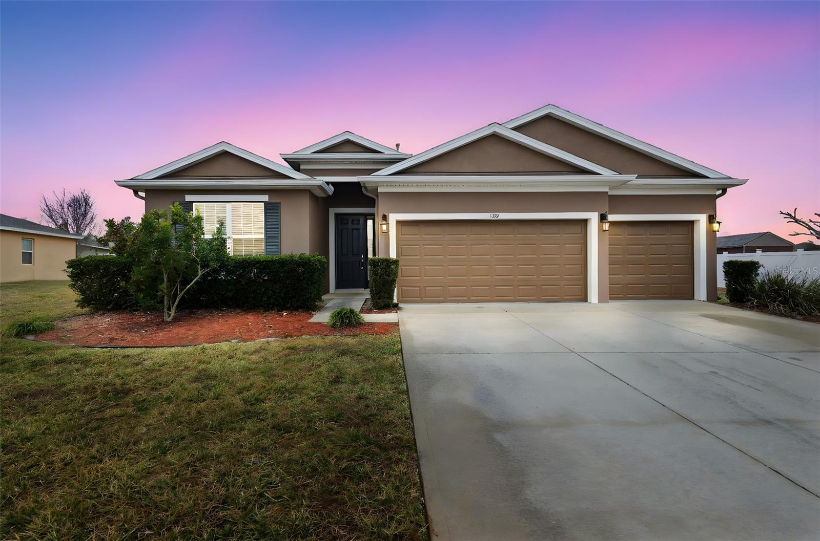 Beautiful 4-bedroom, 3-bath home offering the perfect blend of comfort, space, and modern style. Designed with an inviting open floor plan, this home features a huge living room that serves as the heart of the home—ideal for entertaining guests, hosting gatherings, or simply relaxing with family. The seamless flow between living, dining, and kitchen areas creates a bright and airy atmosphere filled with natural light.Enjoy the convenience and clean look of no carpet throughout, providing easy maintenance and a sleek, updated feel. The thoughtfully designed split-bedroom layout offers added privacy, with the spacious primary suite tucked away from the secondary bedrooms. The primary bedroom provides plenty of room to unwind, along with a well-appointed en-suite bath designed for comfort and functionality.The additional bedrooms are generously sized and perfect for family, guests, or even a home office. With three full bathrooms, mornings run smoothly and guests are easily accommodated. The home’s layout is ideal for both everyday living and entertaining, offering flexibility for a variety of lifestyles.Whether you're enjoying quiet evenings in the oversized living space or hosting friends and family, this home delivers comfort, space, and practicality in one beautiful package.