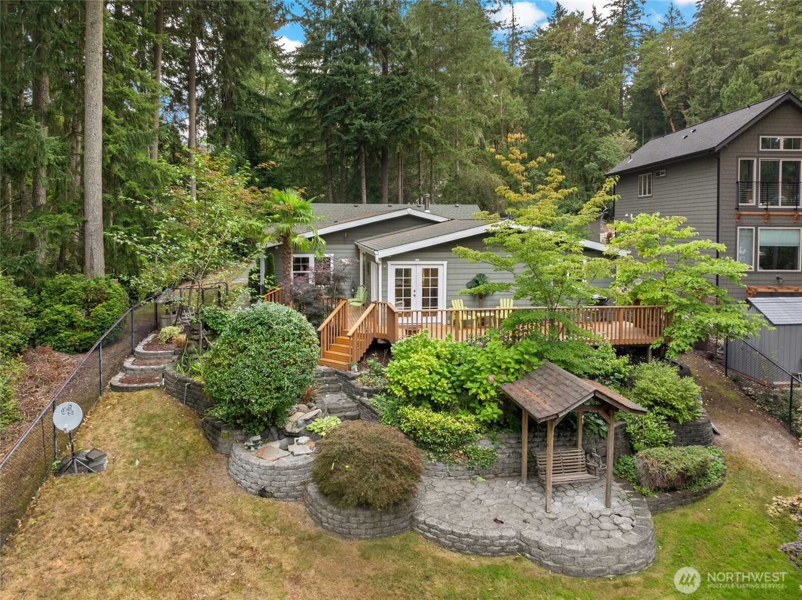 Small slice of paradise on Anderson Island! Situated on Josephine Lake, this beautiful, dialed in rambler is ready for its next steward. You'll love the tucked away feel, the cozy vibes, & all that the island has to offer with this prime location. Lush grounds surround the home with mature landscaping. Inside you'll find light filled spaces and a traditional floor plan. Large bedrooms, great for out of town guests. Primary suite has its own 5-pc ensuite bathroom & large WIC. Open concept kitchen connects with a large deck, perfect for entertaining both inside & out. MASSIVE detached 4 car garage - perfect for all needs. Home is just steps to park with pickleball courts, the public beach of Florence Lake & minutes to the ferry terminal.