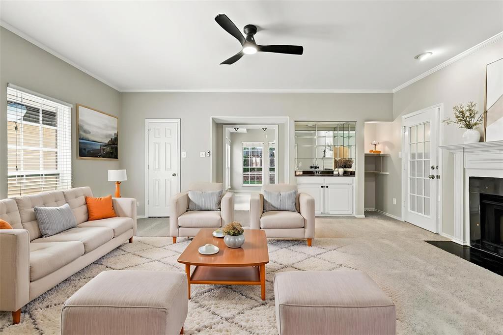 Beautifully maintained with a dedicated office or flex room that can be turned into a 3rd BEDROOM, located in the highly sought-after Timber Creek Village.   Filled with abundant natural light the home features an open-concept layout, a spacious living room with cozy wood burning fireplace and dedicated bar.  Walk right into the bright and inviting kitchen featuring crisp white cabinetry, granite countertops, stainless steel appliances and a spacious island with breakfast bar seating.  Abundant natural light, generous storage and an open layout creates a functional and welcoming space for cooking and entertaining.  The grand primary suite offers a beautifully updated ensuite bathroom double vanity, large walk in closet with organizer and walk out terrace.  Backyard features low maintenance turf ideal for pets and kids.  As an added bonus, this Move-in ready home INCLUDES  Refrigerator, Washer, and Dryer.   One of this home's greatest highlights is its prime location just minutes from Parr Park, one of Grapevine's most treasured outdoor destinations. Spanning more than 40 acres, the park features scenic walking and biking trails, playgrounds, picnic pavilions, sports fields, and wide-open green spaces for recreation year-round. Nature lovers will especially appreciate the beautiful Butterfly Sanctuary, a peaceful habitat filled with native Texas plants that attract butterflies, birds, and other pollinators. Conveniently located near Historic Downtown Grapevine, Grapevine Lake, premier shopping, dining, wineries, entertainment, and DFW International Airport, this home also provides quick access to SH-121 and SH-114 for an easy commute throughout the Metroplex.