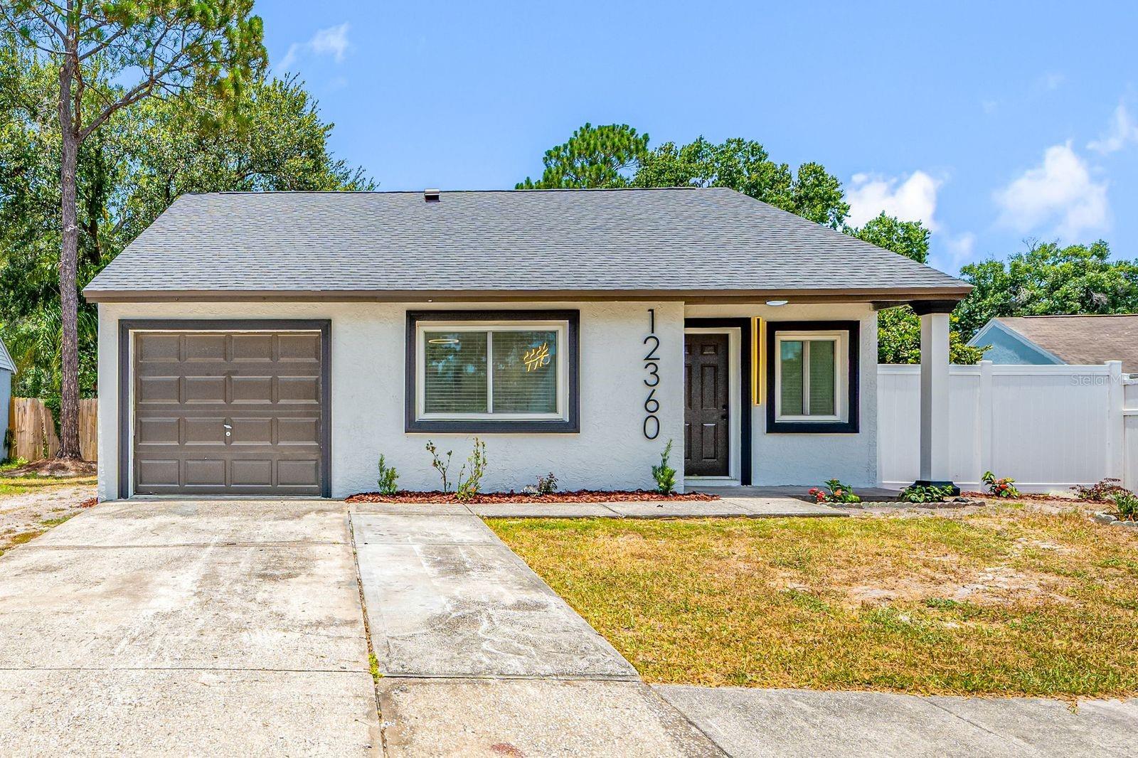 You have to see this beautiful property in one of Tampa’s most desirable neighborhoods.  !!!!Completely renovated 5-bedroom, 4-bath home in prime Tampa location. Two of the bedrooms are private suites with independent kitchens and private entrances — perfect for rental income or multigenerational living. Recent high-end updates include new roof, new AC, new plumbing, full porcelain tile flooring, new electrical, new appliances, impact windows and full new doors. Move-in ready — what more could you ask for?Enjoy Florida living in this turnkey property near shopping, major highways, and A+ schools. Ideal for investors or owner-occupants seeking extra income potential.