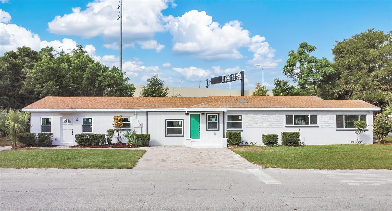 SELLER MOTIVATED!! CONTRIBUTING $10,000 FLEX CASH!!! Potential of an extra 1% for closing costs, just ask your agent!!A FULLY MODERNIZED 5-bedroom, 3-bathroom home offering Modern style, flexibility, and comfort! Step inside to an open and airy layout featuring Luxury vinyl plank flooring, fresh neutral paint, and large windows that fill the home with natural light. The upgraded kitchen is a true showstopper — boasting shaker cabinets, quartz countertops, subway tile backsplash, and stainless steel appliances with stylish hardware accents. Located just a 10 minute walk to Lake Killarney and a 3 minute walk to Killarney Elementary School! What is even more fantastic is the distance to I-4 is literally just 2 minutes away for fast and convenient travel to and from downtown Orlando and just 10 minutes from Park Avenue Winter Park!! So many restaurants, parks, local shops and family activities, Especially during the holidays!! Come see this home with potential income and your own private 3/2 as well.This home includes a versatile 2-bedroom, 1-bath in-law suite with its own private entrance, perfect for extended family, guests, or rental potential. Enjoy extra living space in the spacious Florida room, ideal for entertaining, relaxing, or creating the perfect indoor-outdoor flow. With its thoughtful upgrades and multi-generational layout, this home blends functionality with timeless design — truly move-in ready and waiting for you to make it your own!