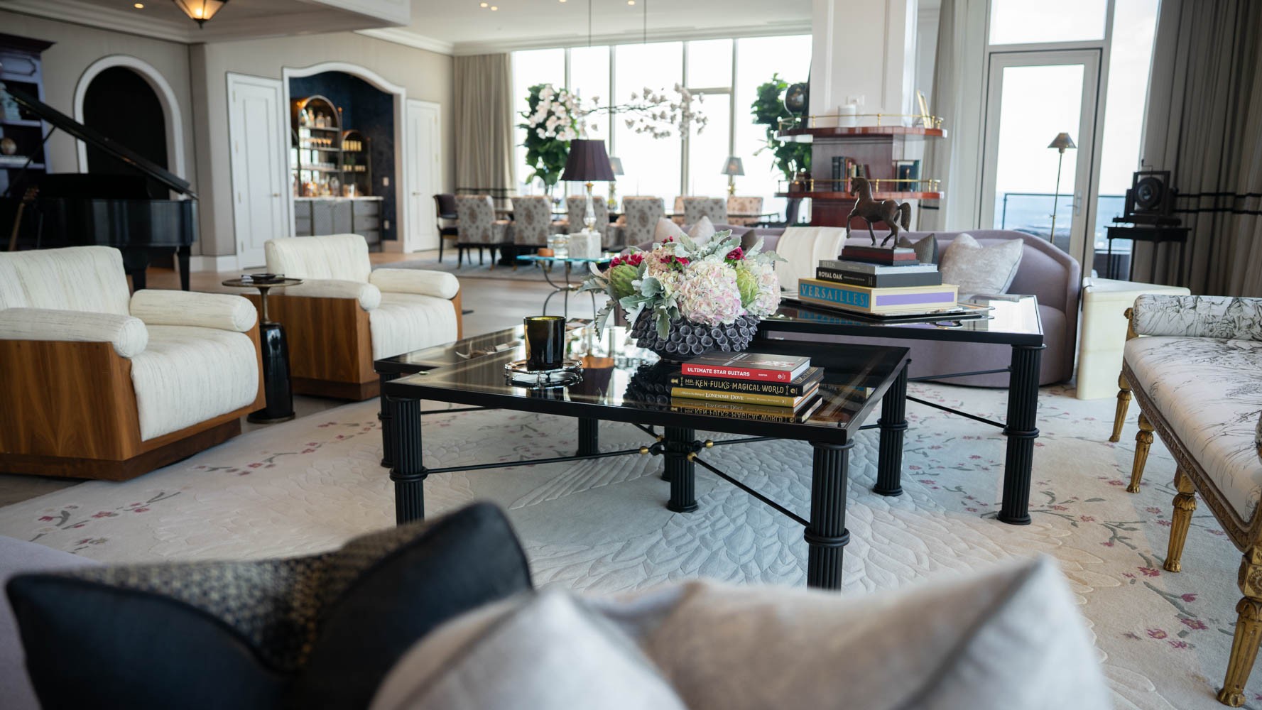 The jewel of the Four Seasons Private Residences Nashville Penthouse, "High Note" is the most beautiful and thoughtfully designed residences in the building. Designed by acclaimed interior designer, Ken Fulk, this residence is an amazing blend of creativity, custom finishing, inventive trim work, and spaces dedicated to keep you entertained or settled in. The Penthouse was lovingly given the nickname “High Note” which set out to celebrate the spectacularly high floor the penthouse is located on while also paying to tribute to Music City and the music notes behind it. The residence takes up half the building’s 38th floor with two open air balconies and views near eye level with the AT&T sign atop the "Batman Building” and spanning from Broadway, over Nissan Stadium (new and old), into the Ascend Amphitheater and down towards Wedgewood-Houston. High Note is being offered fully furnished and stocked with everything one needs to move right in. The stated price of the residence includes the entire art collection which includes works by Darwin, Sinke & Van Tongeren, Tyson Grumm, Hiroshi Sugimoto, and even pieces from local Nashville artists Megan Lightell and Michael Ray Nott.  The residence is freckled with the finest materials carefully curated by Ken Fulk to create this fully furnished masterpiece and provide a true turnkey experience. Wallpapers from Pierre Frey, Phillip Jeffries, De Gournay, and even a custom mural by Jim Boyd on canvas. One of a kind venetian plaster ceiling installations and Fine Paints of Europe built-ins wrap High Note in color and warmth. Every detail accounting for down to the Match Pewter serve ware and custom embroidered dining linens with your very own High Note logo. In addition to all the amenities within the residence, you also get to enjoy the perks of living in a Four Seasons with a 24/7 doorman, valet and front desk staff, the residential sky garden and amenity floor, and access to everything in the Four Seasons Nashville Hotel.
