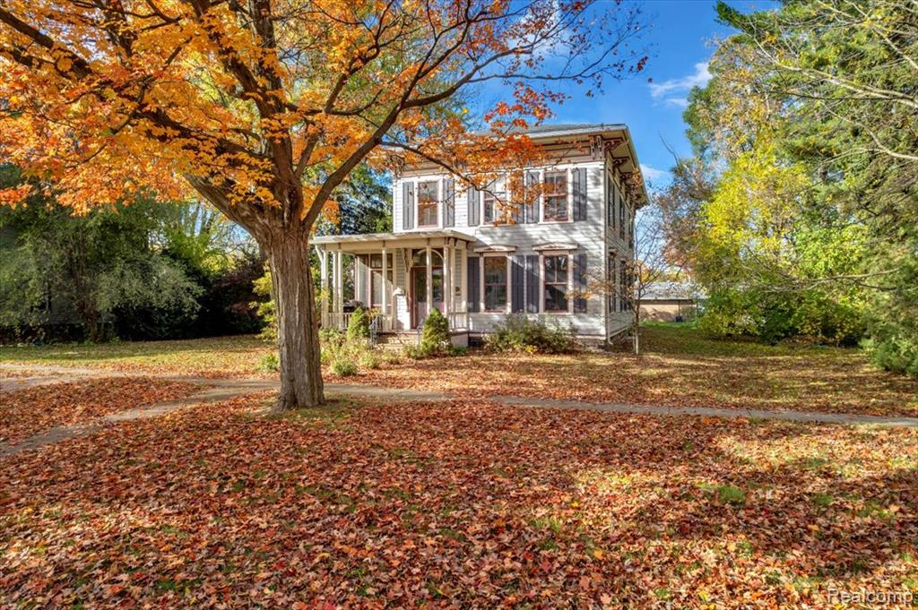 Step into timeless elegance with this beautifully restored historic home located in town with the convenience of city water and city sewer. Offering four spacious bedrooms and two and a half baths this residence seamlessly blends modern comfort with old world craftsmanship.From the moment you enter, you’re greeted by handcrafted woodwork an impressive open staircase and rich oak hardwood floors that flow throughout the home. Each room is filled with character and history showcasing thoughtful restoration and meticulous maintenance that honor the home’s original charm.The layout is warm and inviting perfect for both everyday living and entertaining. Generously sized bedrooms, beautifully updated baths and classic architectural details create a one of a kind atmosphere you won’t find in newer builds.This is more than a home it’s a piece of history lovingly preserved and ready to welcome its next chapter. If you’re seeking elegance, craftsmanship and historic beauty this is the one you’ve been waiting