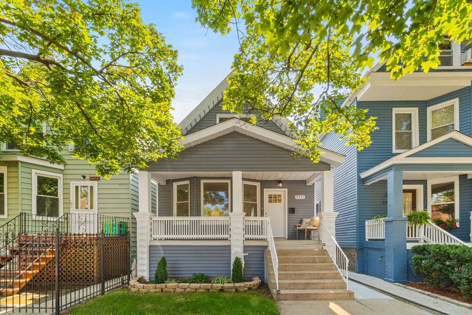 Introducing a fully-rehabbed home on a quiet, tree-lined street in Irving Park, offering nearly 3,000 sq ft of beautifully finished living space. The open floor plan flows from a spacious living room into a chef's kitchen with custom white cabinetry, walk-in pantry, granite countertops, oversized island, and new stainless-steel appliances. This home features 4 bedrooms and 3.5 bathrooms, including a luxurious primary suite with a double-sink bath. The fully finished basement boasts a versatile second living area with half bath, perfect for a home bar, office, or creative studio. Recent improvements include all-new plumbing, electric, walls and insulation, dual-zone central heat and A/C, new windows, new engineered hardwood floors (vinyl in basement), and updated landscaping. Additional highlights include a 2-car detached garage, backyard with grass and concrete patio, a newer roof (2019), and kitchen appliances and HVAC systems that are brand new.  Ideally located near the Blue and Brown Lines, expressways, parks, gyms, acclaimed restaurants, and nightlife, this home combines modern comfort with unbeatable neighborhood convenience.