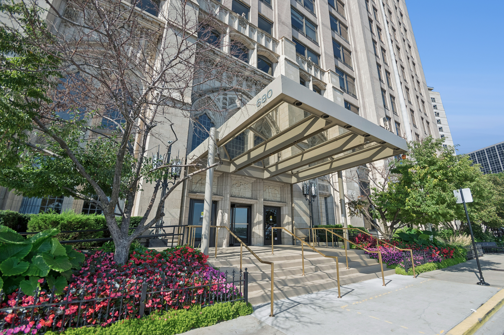 Welcome to this impeccably maintained and spacious 3-bedroom, 2.1-bathroom residence, perfectly situated in a full-amenity building in the heart of Streeterville and within the coveted Ogden Elementary School district.  680 Lake Shore Drive is an iconic Chicago building spanning one block in the heart of the city and at the lake's shore.   Step into an opulent, open-concept floor plan filled with natural light from expansive south-facing windows. The chef's kitchen features high-end stainless steel appliances, ample cabinetry, and a walk-in pantry-ideal for everyday living and entertaining alike as well as an eating area which is perfect for family meals. Just off the kitchen, the well-appointed dining area flows seamlessly into a generous living room.  The gracious primary suite offers his-and-hers closets and a luxurious, spa-inspired en suite bath with natural stone finishes, oversized vanity, Jacuzzi tub, and separate shower with body sprays. Two additional bedrooms, a stylish full bath, a convenient powder room, and a laundry room complete this thoughtfully designed home  Set within an architecturally significant building, residents enjoy recently renovated common areas and luxury amenities including a 24-hour door staff, indoor pool, Jacuzzi, sauna, fitness center, bike storage, laundry room, and on-site management. Just steps from Oak Street Beach, Navy Pier, Water Tower Place, theaters, and world-class shopping and dining-this location can't be beat. Nearby parks offer dog-friendly spaces, tennis courts, running paths, movies in the park, and jazz nights. This is city living at its best! Deeded parking available for an additional $65,000.