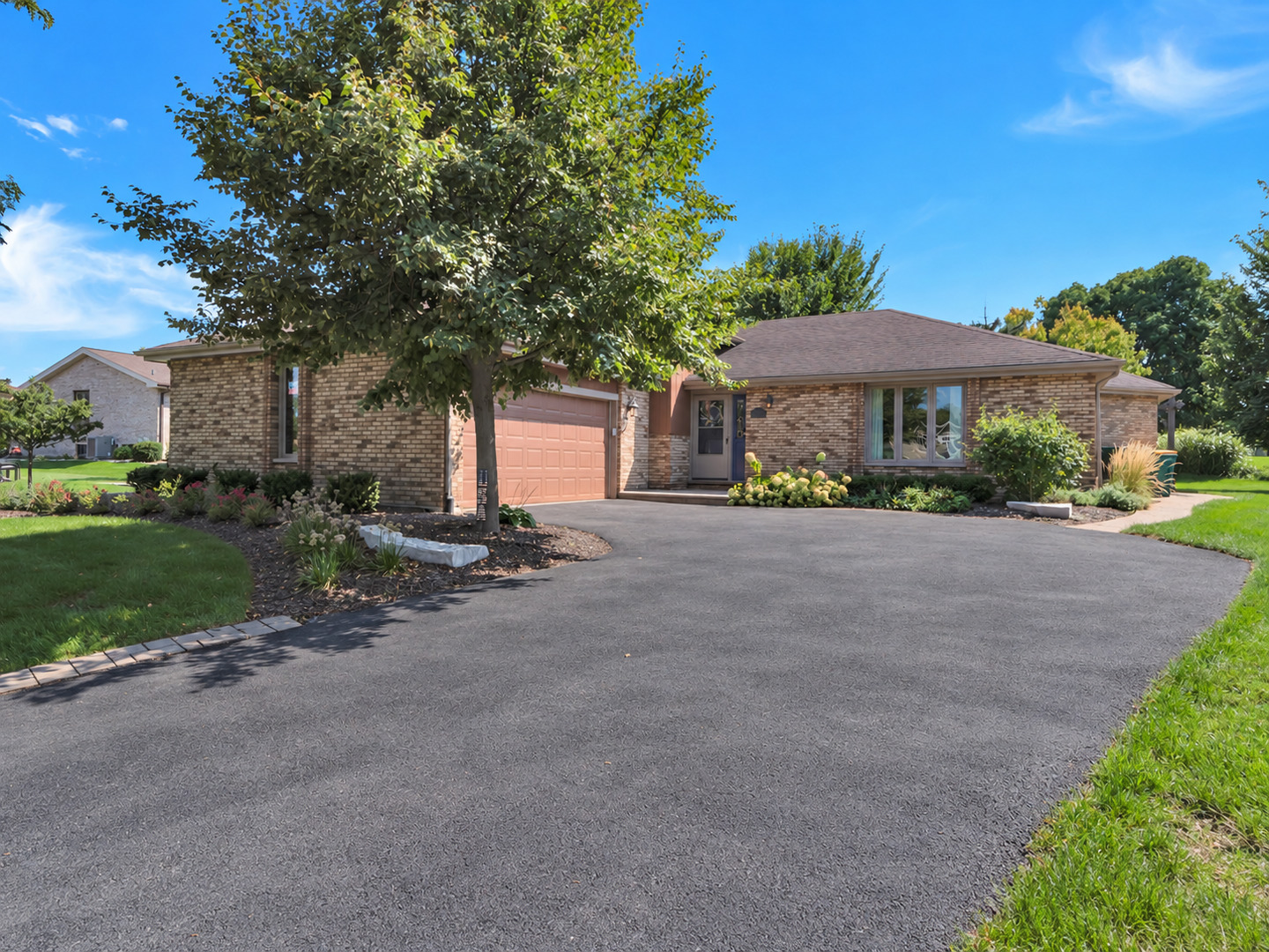 Welcome to this inviting Lemont home tucked away on a quiet cul-de-sac, offering generous living space and an exceptional outdoor retreat. The oversized yard features updated landscaping, trees, a stamped concrete patio, pergola, hot tub, and expansive decking-creating a wonderful space for relaxing, entertaining, and enjoying the outdoors.    Inside, the gourmet kitchen is a standout with maple cabinetry, granite countertops, stainless steel appliances, recessed lighting, and plenty of workspace. The primary suite offers a beautifully appointed bath with Carrara marble tile and countertops.    The lower level provides additional living space and features a completely remodeled bathroom with a luxurious steam shower, updated in 2026. The laundry/mud room was also redone in 2026 with updated cabinetry, adding style and functionality. All upstairs bedrooms feature brand-new carpet.    Additional highlights include a gas heater in the garage and ample storage space. Conveniently located near shopping, schools, dining, and I-355, this is a home that truly has it all-space to spread out, stylish updates, and an incredible outdoor setting designed for making memories. Come see everything this special Lemont home has to offer-you won't want to miss it!