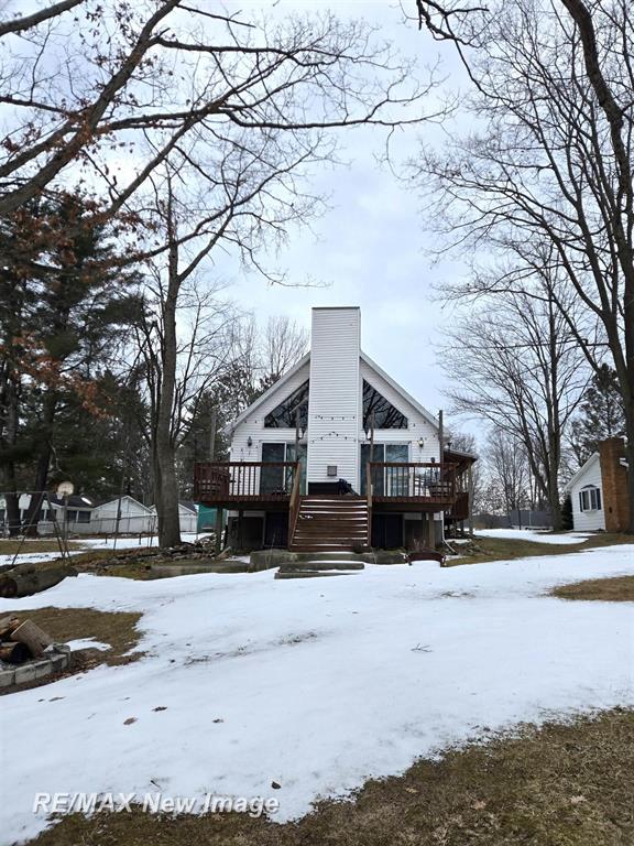 Get yourself a cabin on Wixom before the lake fills up and prices jump!!  This place offers 3 bedrooms, 2.5 bathrooms, a nice deck with great views.  There is a large outbuilding for all of your summer and winter toys.  The main road is set to be paved this year once the frost laws are removed.