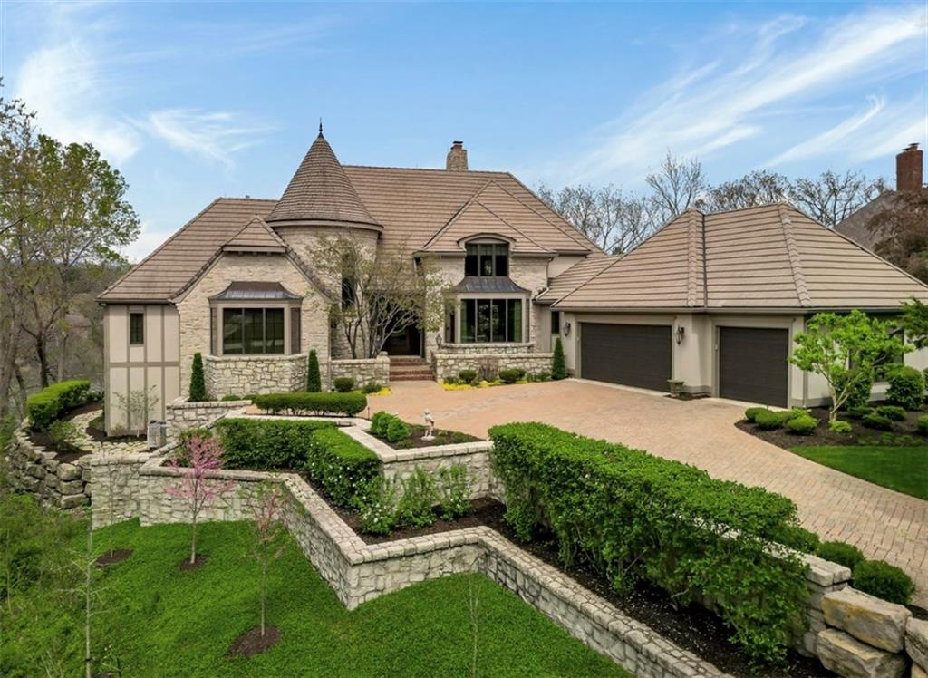 Rare opportunity to acquire one of Cedar Creek's Signature, lake-front Residences! This authentic French Normandy design by renowned architect Howard Nearing was custom built by Steve Grewal. Thoughtfully placed on its 1-acre lake front lot, this home sets deep off the street to insure the ultimate in privacy and views, overlooking both Shadow Lake & beyond of the 1st & 9th Holes of the Shadow Glen Golf Club. Extensive stonework, paver brick drive, copper bays, concrete tile roof all accentuated with lush landscaping creates European countryside appeal. This premier property has been meticulously transformed by the current owner. The list of recent major renovations is highlighted by a new McCroskey Interiors kitchen appointed with Wolf/Sub-Zero appliances, custom front entry door & sidelights, 3-level blown glass chandelier by John Pomp Studio, wide plank engineered hardwood flooring thru-out, expanded Pella windows & doors, California Closets transformations, & luxurious lighting to define every space. Garden show level landscaping & hard-scaping on all sides, new 3-zone HVAC, knotty alder 8 ft doors w/Emtek hardware, spray foam insulation to both roof & rim joists, honestly there's just too many upgrades to list. If ever the term "better than new" was applicable, this one fits the definition. Lower-level exercise room could be converted back to a 5th bedroom w/full bath if needed. Seller is open to negotiate a transaction to include furniture if preferred by a cash buyer.