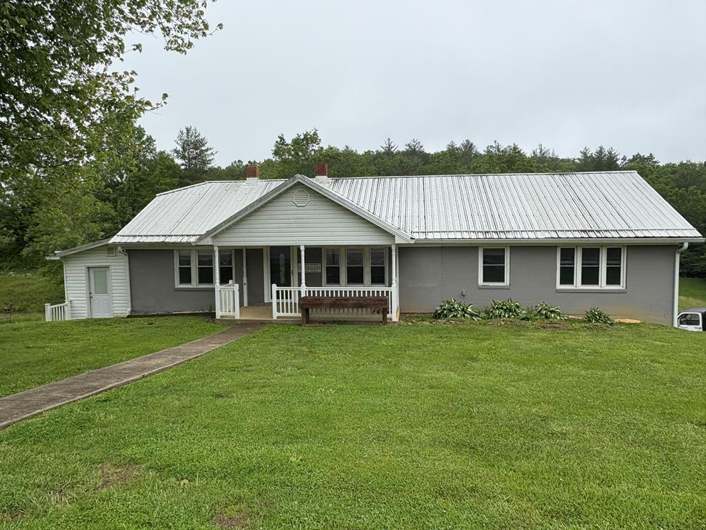 Whether you're a first-time homebuyer or looking for that weekend getaway, come take a look! Located in beautiful western Grayson County, minutes from the New River. This nicely renovated 1620 Square ft ranch home offers country living at its finest. Enjoy endless possibilities with this 1.56 acre unrestricted lot that is partially fenced with a pond, makes it ideal for small livestock. Go inside to this naturally lit, spacious floor plan that offers plenty of entertainment options for family and friends. A country kitchen featuring a refrigerator, stainless sink, microwave, dishwasher, and stove, perfect for preparing a large meal for family and friends during those special occasions. Enjoy the fruits of your labor by sitting down to a fine home cooked meal in a dining room designed for large gatherings and convenience. Read a book or visit with guests in the warm and inviting formal living room. Embrace a wonderful nights sleep in a roomy master suite that features a his and hers closet with ample space for your clothing. Two full baths, one that includes a full size shower, double sinks, and plenty of cabinet space. This home offers a full basement with a 2 car garage. Don't let this one get by you, schedule your showing today.