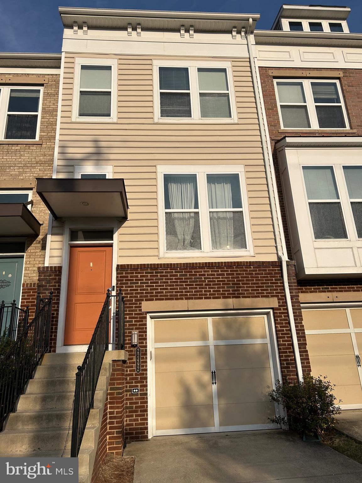 Experience breathtaking sunset views over the Blue Ridge Mountains from this stunning three-level interior townhouse. This home offers a spacious layout featuring 3 bedrooms and 3.5 bathrooms, including two bedrooms on the top floor, a private lower-level suite with a walk-out to a fully fenced backyard.Roof replaced in 2025, Microwave 2026, Refrigerator updated 2024.The monthly HOA fee provides incredible value, covering Cable TV and High-Speed Internet, trash removal along with access to multiple community swimming pools. Perfectly situated just a short distance from the Brambleton Town Center’s restaurants, movie theater, and library, and only minutes from the Dulles Toll Road (267) for an easy commute.