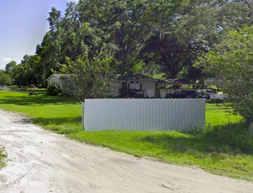 Investor Special — 1.12 Acres, No HOA, No CDD! Priced to Move at 401 Sparkman Rd, Plant CityCalling all investors and flippers — this is the deal you've been waiting for. Priced below market value, this spacious 3-bedroom, 2-bathroom ranch-style home sits on a sprawling 1.12-acre lot with mature landscaping and NO HOA or CDD restrictions to slow you down.At 2,110 square feet, this open-floor-plan home offers serious upside for the right buyer. Highlights include a cathedral-ceiling living room with a cozy fireplace, a functional split layout, and a block foundation with vinyl siding and a shingle roof. A detached shed adds bonus storage or workshop potential.Located in unincorporated Hillsborough County just minutes from downtown Plant City, this property offers the rare combination of acreage, privacy, and proximity to town — exactly what today's buyers are searching for once renovated.Bring your vision and your contractor. Homes with this much land, this little red tape, and this much room to add value don't last. Schedule your showing today!