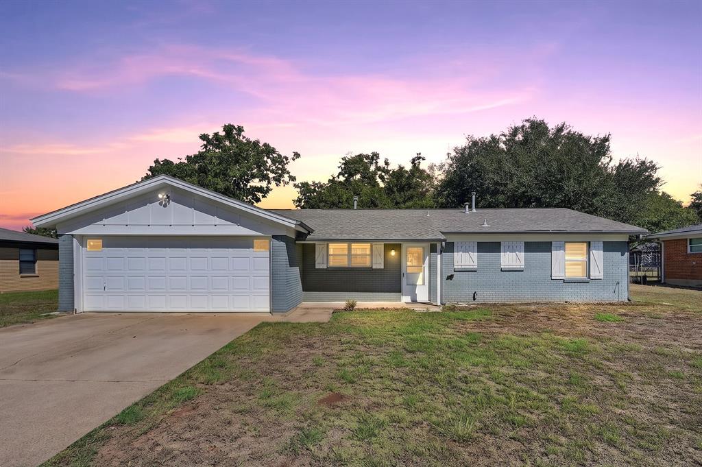Centrally located in the DFW Metroplex with easy access to major highways, this charming three bedroom, two bath home offers a spacious floor plan and an oversized backyard on more than a quarter acre. Beautiful wood flooring flows throughout the main living areas, creating a warm and inviting atmosphere. The updated kitchen offers granite countertops, white cabinets, and stainless steel appliances, featuring a recently replaced range and a refrigerator that conveys. One of the home's standout features is the huge game room with a beautiful wood-beamed ceiling, offering plenty of space for relaxing, entertaining, or gathering with friends and family. From the game room, head directly outside to the expansive backyard, where mature shade trees, a fire pit, and a large pergola-covered patio create a peaceful setting for outdoor dining and entertaining. With plenty of room for gardening, recreation, or simply relaxing outdoors, the backyard also includes a storage building for tools and lawn equipment. With its generous indoor and outdoor living spaces, thoughtful updates, and convenient location, this home has plenty to offer. Take a first-person look at this gorgeous home! Click the Virtual Tour link to see the 3D Tour!