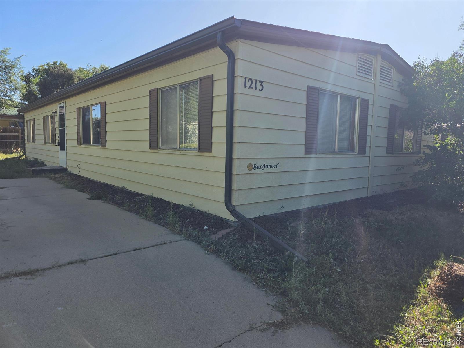 Opportunity awaits on this home with land. Larger modular home with a double-lot in The Glens and the land is owned, no lot rent, no HOA, and affordable taxes. Original owner home with an open floor plan, upgraded siding, and room for improvement on the inside. Exterior features metal siding, off street parking, as well as on street room. Need a garage, plenty of land to add a shop or garage. Estate owned, so the seller does not have a lot of additional information in regards to property condition, but everything works as it should. Do not wait on this chance to own a home and build equity.