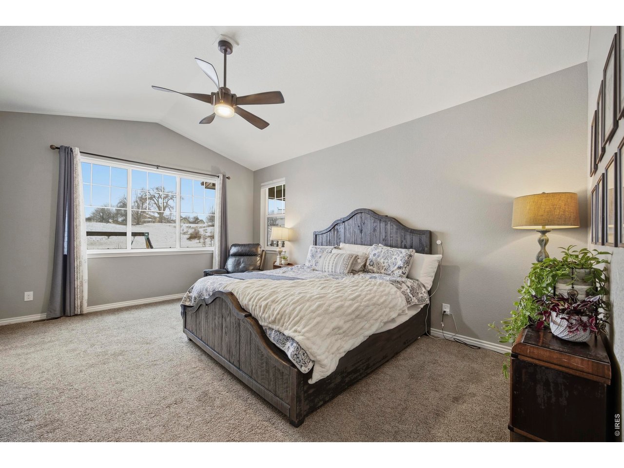 Welcome to refined Colorado living in this beautifully designed ranch-style home built in 2017, offering 3 beds and 3 baths on one of the largest lots in the Bucking Horse Estates neighborhood. The thoughtfully designed open floor plan is filled with natural light and highlighted by soaring vaulted ceilings and elegant finishes throughout. At the heart of the home, the chef's kitchen impresses with slab granite countertops, a generous island perfect for gathering, abundant cabinetry, and an oversized walk-in pantry that makes both everyday living and entertaining effortless. The great room offers warmth and comfort with a cozy gas fireplace, creating an inviting space to relax or host guests. A dedicated home office provides a quiet and polished work-from-home environment. The primary suite is a private retreat featuring a spacious layout and a luxurious 5-piece bath designed for comfort and relaxation. Outdoor living is just as impressive. Enjoy peaceful mornings on the charming front patio or unwind on the covered back patio overlooking the expansive backyard, which includes fruit trees and a full irrigation system. With unmatched lot size, there is ample room to create your dream outdoor oasis. Ideally located close to the neighborhood pool, park, and Fort Collins trail system, this home blends tranquility with convenience and access to recreation. Additional highlights include an EV charging station and a full unfinished basement offering limitless potential to design and customize additional living space tailored to your lifestyle. A rare opportunity combining space, sophistication, and an exceptional setting.