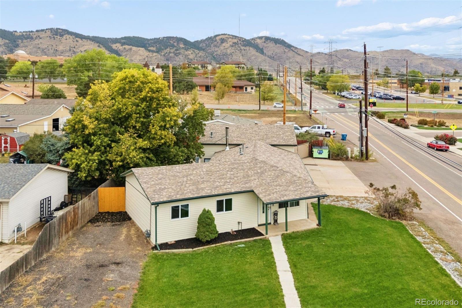 Incredible opportunity.  Heart of Golden. Remodeled and updated.  Slab granite countertops. New paint and carpet. Massive garage space. Additional parking. Perfect for a car enthusiast, Workshop, Mechanic, endless options. Mountain views surround.
