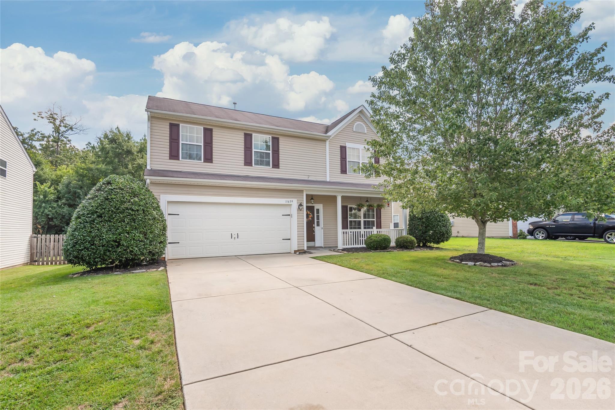 Space to spread out, a backyard made for gathering, and a location that keeps you connected to everything you need. Welcome to this completely move-in ready home in highly desirable Tucker Chase! Perfectly positioned on a spacious .23-acre, fully fenced level lot, this home offers an incredible combination of space, functionality, privacy, and value. Located just minutes from Locust with easy access to Charlotte, Concord, Mint Hill, and Harrisburg, you'll enjoy the quieter pace of Midland without sacrificing convenience. Inside, the large family room is anchored by a cozy gas log fireplace and flows effortlessly into the beautifully appointed kitchen featuring granite countertops, abundant cabinetry and prep space, a large deep sink, freshly replaced dishwasher, huge pantry, and adjoining breakfast area. A separate oversized dining area gives you plenty of room to host the whole crew, making this floor plan perfect for everyday living and even the largest family gatherings. Upstairs, a spacious loft provides valuable additional living space and is ideal for a home office, playroom, media room, or second family room. The massive primary suite offers a true retreat with a large walk-in closet and ensuite featuring dual vanities, a garden tub, and separate shower. Generously sized secondary bedrooms, ample storage throughout, and a spacious upper-level laundry room add to the home's everyday functionality. Step outside and you'll quickly see why this backyard is something special. The brand-new, oversized stamped concrete patio creates an incredible extension of the living space with plenty of room for outdoor dining, entertaining, grilling, or simply unwinding at the end of the day. Beyond the patio, the fully fenced, level backyard is lined with mature trees for added privacy. From the charming front porch to the private backyard and flexible living spaces in between, this home checks all the boxes. Homes offering this much space and value in Tucker Chase rarely stay available for long!