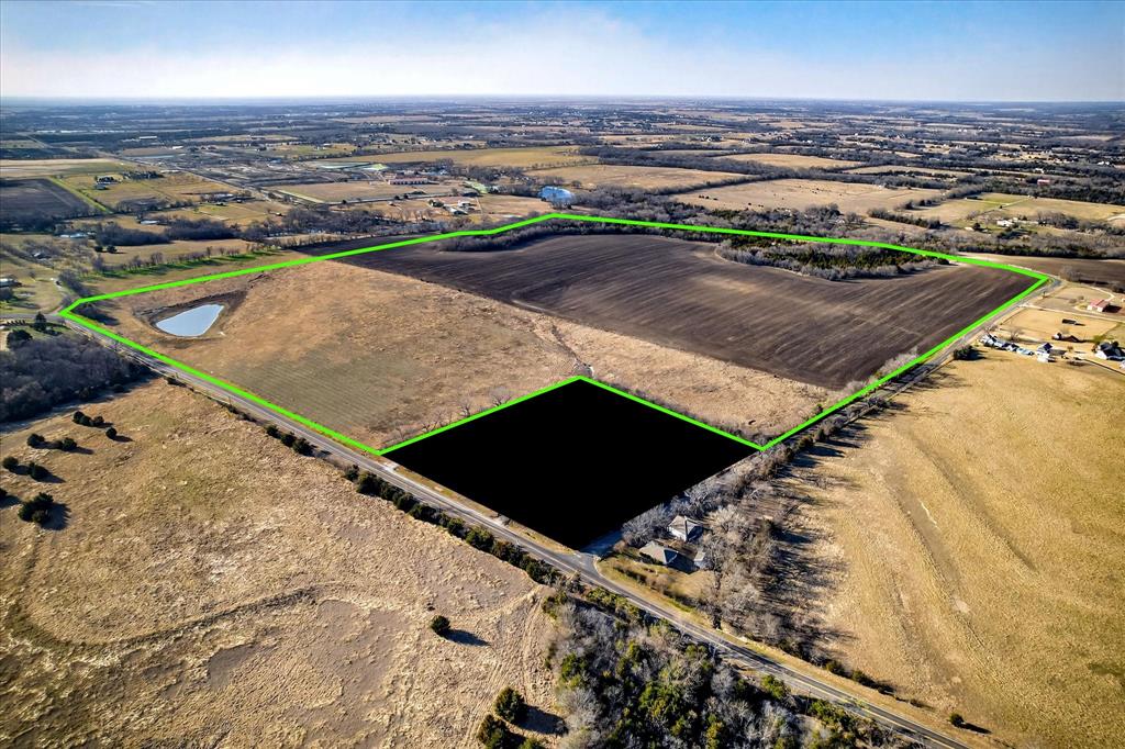 GREAT SWEEP OF ROLLING HILLS, VAST VIEWS, WHITE ROCK OUTCROPPING AMONG TREES ALONG AREA LEADING TO THE CREEK! OVER HALF MILE ROAD FRONTAGE ON EDEN RIDGE ROAD! PLUS OVER 700' FRONTAGE ON FM 455! This land is beautiful! Water Tower of Van Alstyne is visible from this hillside and when you drive south on FM3356 to FM 455, this hillside is visible for several miles! The Butterfield Stage used to come right past this land in the 1800s! Texas History at its finest! Rare treat just to enjoy the views and feel the atmosphere where early settlers traveled to bring to life the Texas we all now enjoy. The East Fork of the Trinity is about half a mile away where the bridge is being rebuilt for easier travel. Just think, the stagecoaches had to ford the river! Come see for yourself!