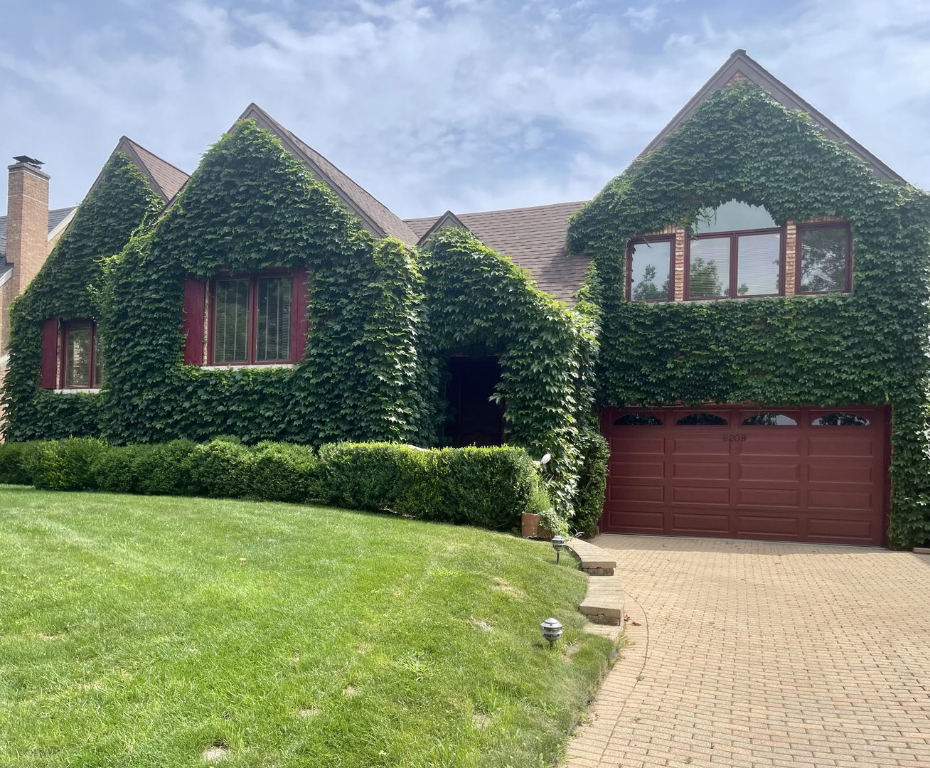 One-of-a-Kind 4-Bedroom Home in Niles!  Set on an 8,500 sq. ft. lot with 3,400 sq. ft. of living space, this thoughtfully designed 4-bedroom, 3-bathroom home offers a perfect blend of comfort, style, and modern life. With the addition in 2004, the entire home was upgraded with copper plumbing, energy saving LED lights throughout, custom made windows, and all-new electrical wiring, this home was completed with exceptional attention to detail. The vine-covered exterior transforms this home into a storybook escape, especially from May through October, giving it a charming, castle-like feel that is as picturesque as it is unique.  Main Level  ** Two spacious bedrooms and a full bathroom that also serves as a powder room.  ** Open-concept living room with high ceilings, skylights, and a natural wood-burning fireplace with gas starter for cozy ambiance and efficient heating.  ** Seamless flow between the dining area and kitchen, equipped with stainless steel appliances including a double dishwasher with both units operating independently.  Second Level  ** Two en-suite bedrooms, including a beautiful suite with skylights, a private balcony overlooking the backyard, and an en-suite bath.  ** Spacious primary suite featuring skylights, a custom-designed walk-in closet, and a luxurious master bath with a jacuzzi.  ** Loft-style office with closet space and an open balcony overlooking the living room.  Upgrades & Features  ** Bamboo hardwood floors throughout.  ** Custom-designed windows allowing for abundant natural light.  ** Smart home ready with network and audio cabling.  ** Usable attic storage space.  ** Two independent HVAC systems for personalized comfort through separate smart thermostats.** Two laundry areas - one in the master suite and another in the half-finished basement.  ** Outdoor Living**  Expansive wooden deck with built-in lighting, wrapping around the backyard.  ** Lush landscaping with around 60 evergreen trees and a peaceful pond.  ** Heated & air-conditioned extended garage that can fit 3 cars, dual overhead doors with the second door leading to a beautiful rear patio, perfect for BBQ area.  ** Brick driveway with lighting, accommodating two cars.**  With its fairytale-like curb appeal, smart updates, flexible floor plan, and prime location, this home is a rare opportunity in Niles. Don't miss your chance to see it in person - schedule your private tour today!