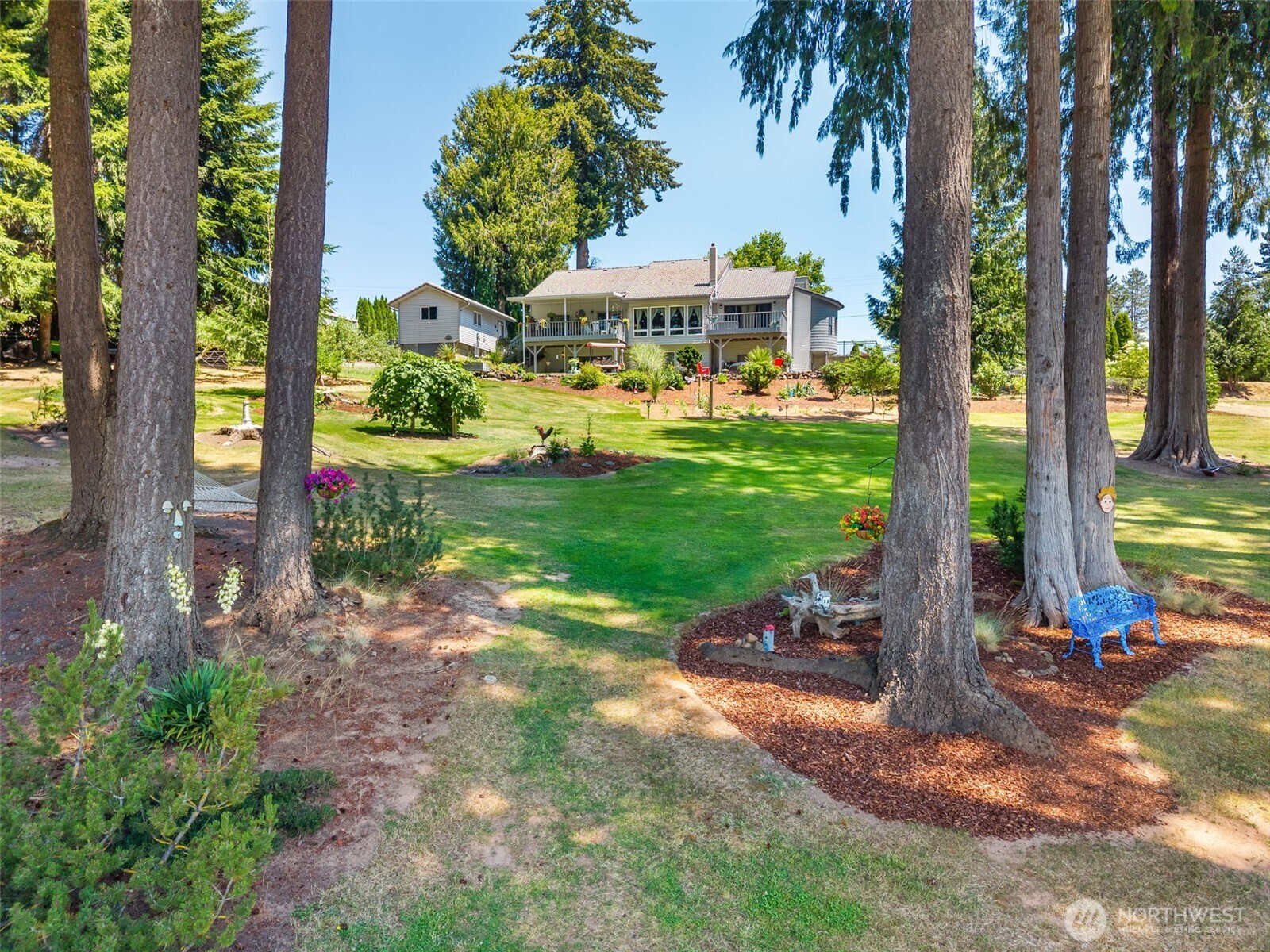 Exceptional Adna property offering breathtaking views, two primary en suites, multiple living spaces, a loft, and a beautifully remodeled open kitchen with adjoining dining area designed for entertaining. Outside, enjoy meticulously landscaped grounds with garden space, fruit trees, and a sprinkler system. The private pond is perfect for swimming and fishing and features a dock with slide, while the regulation sand volleyball court and horseshoe area create an incredible setting for recreation and gatherings. Thoughtfully designed for year-round enjoyment, the home includes a wood stove that provides cozy warmth, generator-ready wiring for added peace of mind, and sits on land that has historically remained high and dry during seasonal flooding in surrounding areas. Built by the original owners, this one-owner home reflects exceptional pride of ownership, with photos documenting the home’s construction from the ground up. A rare opportunity to own a truly special property offering comfort, quality, privacy, and an unmatched lifestyle.