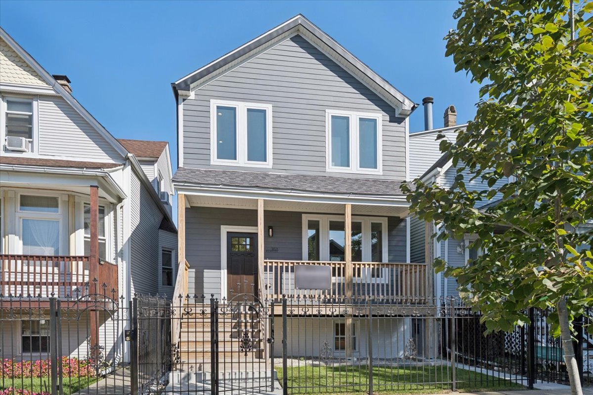 Nothing to do but move in to this flawlessly renovated 4-bedroom, 4-bath single family home in Irving Park! The current owner brought this home down to its studs, added a second floor, and completely redesigned the space with clean, modern finishes. A classic front porch with ample space for seating or a porch swing is the ideal space to relax. Natural light from large windows with south, east, and west exposures floods the entire living space on the main level. An open floor plan flows seamlessly through generous living spaces including a living room with enough space to accommodate two separate seating areas and a dining area with ample space to host both dinner parties as well as intimate affairs. Glass French doors open into the perfect home office conveniently located just off the kitchen. The chef's kitchen is appointed with stylish features such as veined quartz counters, Marfa cabinetry, stainless steel Bosch appliances, and access to a private deck overlooking the backyard - the perfect place for dining al fresco. A full bathroom completes this level. Upstairs, a serene primary suite features a large bedroom with south-facing views overlooking Richmond Street, a huge walk-in closet, and an elegantly appointed ensuite bath. Two additional bedrooms and another full bath occupy this level along with a closet fully plumbed and ready to hook up your washer and dryer. The lower level has a family room, a fourth bedroom, full bath, and an additional room perfect for a den, another home office, playroom, or hobby room. Plenty of green space abounds in the backyard, which leads to the detached, 2-car garage. This special home is situated on a quiet, tree-lined street within walking distance to Lane Tech and DePaul Prep with easy access to public transportation and the expressway, Target, Mariano's, shopping, restaurants, and all Irving Park has to offer. Welcome home!