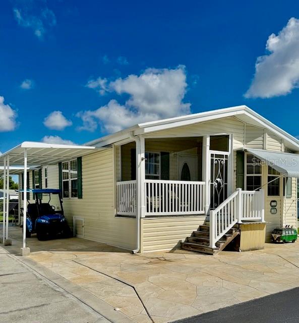Calling all Snowbirds...Your Perfect Florida Winter Retreat Awaits! Enjoy the best of Southwest Florida living in this beautifully appointed, 2-bedroom, 2-bathroom manufactured home in Fort Myers! Pine Ridge Palms is a gated, small quaint neighborhood comprised of resident-owned park model homes and and recreational vehicles. Built in 2013 and offered turnkey furnished, this move-in-ready home features contemporary furnishings and stylish décor, creating a welcoming space where all you need to do is unpack and start enjoying the Florida lifestyle. Relax and unwind on the front screened porch or rear porch - perfect spots to enjoy your morning coffee or evening breeze. Take advantage of the community’s inviting pool and spa, ideal for soaking up the sunshine and connecting with neighbors. With beautiful beaches, shopping, dining, and all the attractions of Southwest Florida nearby, you’ll love having so much to explore just a short drive away. Practical features add even more appeal, including covered parking for your car AND GOLF CART, an elevated storage unit for extra space, and a new roof backed by a lifetime transferable warranty for added peace of mind. Whether you’re searching for the perfect seasonal escape, a sunny winter getaway, or a comfortable, fully furnished home to enjoy year-round, this charming property checks all the boxes. Simply arrive, settle in, and start living the Florida dream!