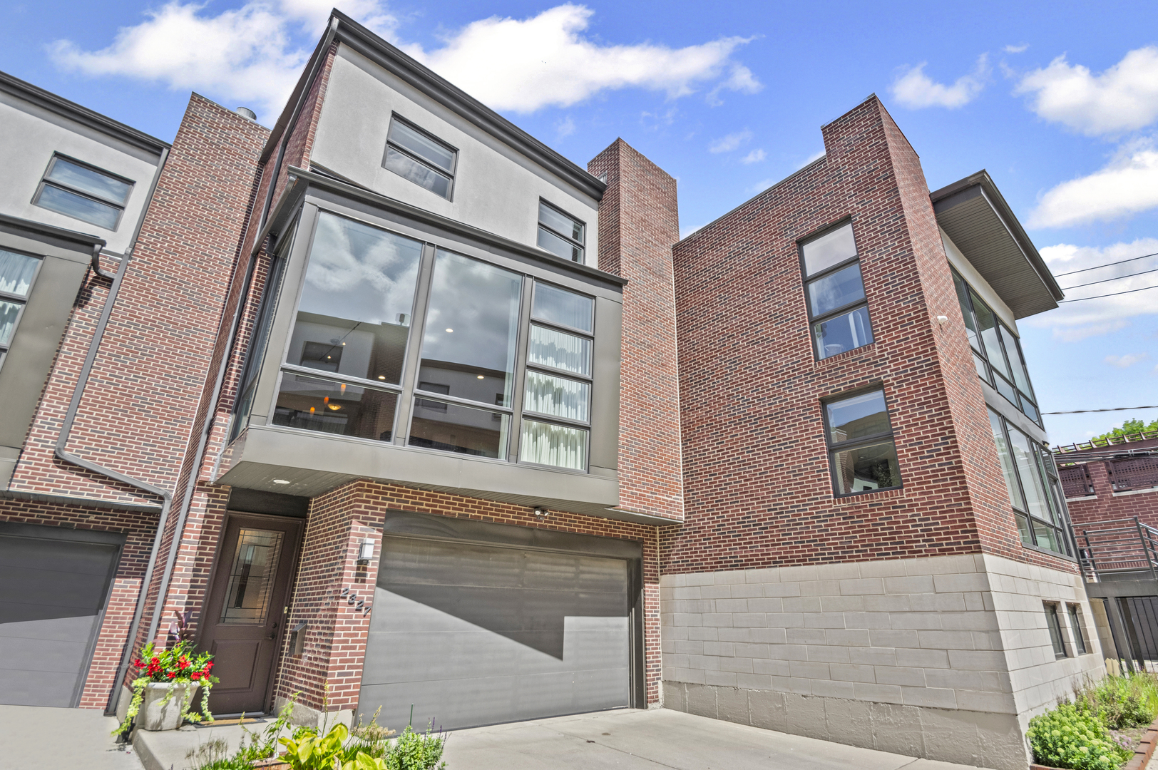 Over 3500 sq. ft. townhome in beautiful condition with 11 ft. ceilings, floor to ceiling windows  located in Lincoln Park gated community, Bosworth Place. First floor has a huge family room which opens up to a stunning 450ft private patio, full bath and laundry room.  Second floor has a gorgeous living room flooded with natural light, wood burning fireplace, newly refinished floors, dining room with built in, stylish powder room, gourmet kitchen and great room. Kitchen has a huge island with quartzite countertops and backsplash, high quality cabinetry, new appliances, balcony overlooking patio and opens up to the great room.  Third floor has an expansive primary suite and 2 spacious bedrooms. Primary suite has spa like bath with a soaking tub, walk in  shower and dual vanity. With a 2 car attached garage this home lives like a single family and in a in a perfect Lincoln Park location