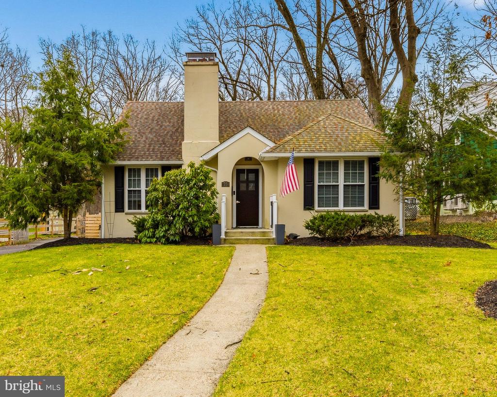 Step into this beautifully updated and well maintained 4bed/2bath cape cod home set on a premium half acre lot. From the moment you enter, you are greeted by the warm and inviting living area featuring hardwood floors, recessed lighting and a cozy gas fireplace. The heart of the home is the dream kitchen, thoughtfully designed to impress with stunning quartz counter tops, modern lighting and an abundance of cabinet space. The large center island serves as the ultimate gathering spot, offering plenty of prep space, seating, and a built in wine/beverage fridge for easy entertaining. Whether you are hosting or enjoying a quiet night in, this kitchen is the true centerpiece of the home. Enjoy the convenience of main floor laundry, along with a bright and inviting sun room. Two generously sized bedrooms and a beautiful full bathroom complete this level. Upstairs, you will find two well appointed bedrooms with ample closet space, along with an updated full bathroom showcasing a walk in shower and stylish newer tile finishes. The possibilities continue in the large unfinished basement, featuring high ceilings and endless potential to customize. Outback enjoy a beautiful stamped concrete patio that is perfect for outdoor entertaining. The incredible 20x40 pole barn is the ultimate bonus space! Perfectly designed for entertaining, relaxing and making memories. With soaring ceilings, and exposed beams, the space offers an open feel while still being  inviting. Inside, you'll find a full bar with water access, granite counter tops and ample seating.  Whether you envision it as a hang out space, workshop, garage, hobby space, etc. you have endless options in this amazing addition.  This space is truly a stand out feature of the property and a rare find that takes outdoor living and entertaining to the next level.  A full automatic sprinkler system, newly installed in 2025, adds convenience and keeps grounds green all season long. Homes like this don't come around too often, schedule your private showing today to see everything this exceptional home has to offer!