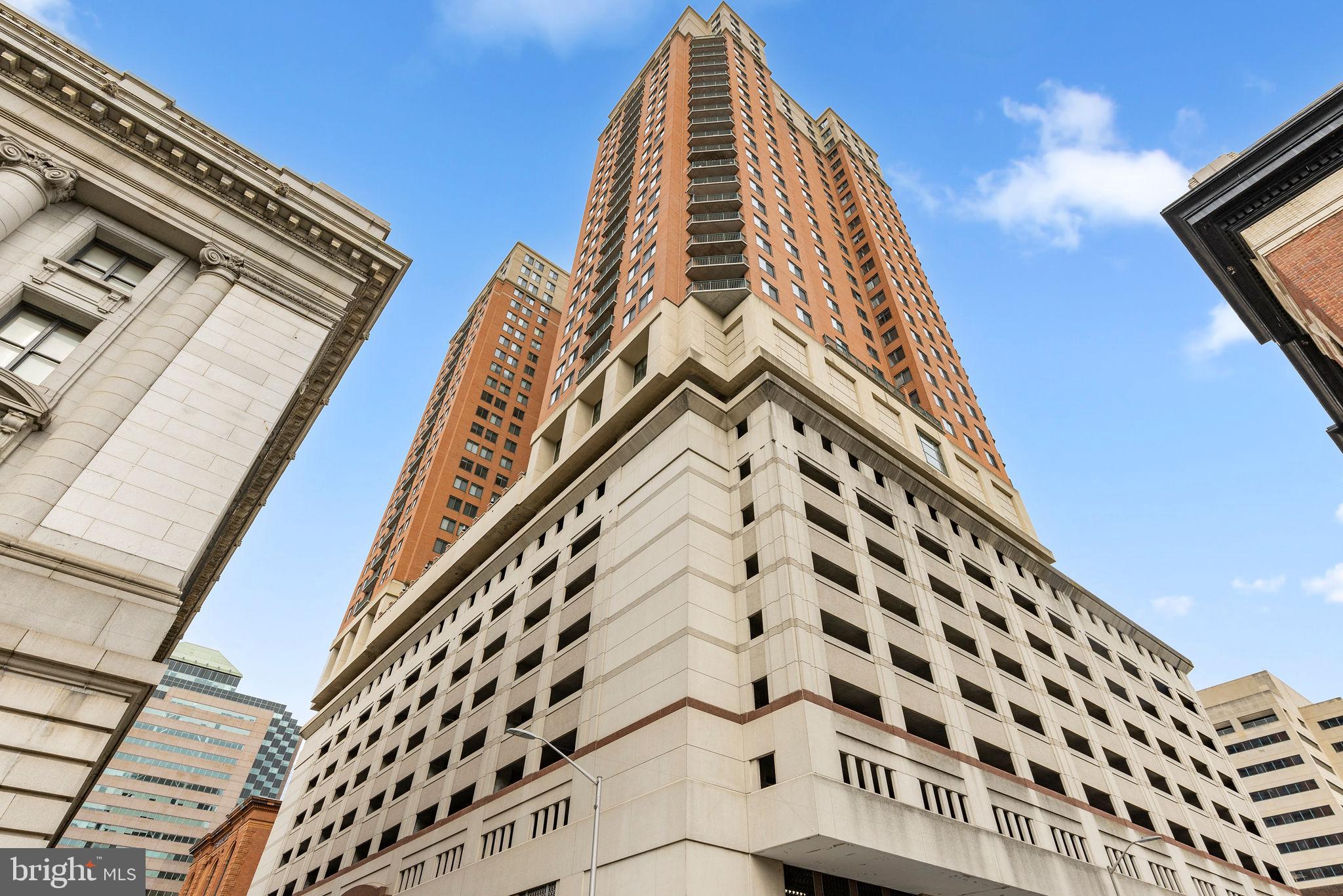 **short-sale approved at list price: Buyer to pay a short sale negotiation fee of $6,000.00 or 2% of the purchase price, whichever is greater, upon closing.** Welcome to your Inner Harbor sanctuary—an updated 2-bedroom, 2-bath condo offering city living at its finest.Perched on a high floor with spectacular harbor and cityscape views, this residence features a stylish kitchen with warm wood cabinetry, granite countertops, stainless steel appliances including a gas stove and microwave range hood, and a spacious center island with bar-height seating—perfect for casual dining or entertaining. The light-filled family room opens to a private terrace, inviting you to unwind while taking in the vibrant city below. The owner’s suite includes a generous walk-in closet and a private en-suite bath, while the second bedroom offers flexibility for guests, an office, or additional living space. The home is tastefully appointed with neutral paint, new flooring (2021), and a new HVAC system (2023). Enjoy resort-style amenities, including an outdoor pool, fitness center, 24-hour concierge and security, party and meeting rooms, elevator access, and more. This unit also comes with a deeded same-floor storage unit (approx. 35 sqft) and an allocated covered parking space—a rare Inner Harbor perk! All of this, just minutes from the National Aquarium, Inner Harbor attractions, museums, restaurants, the farmers' market, and major commuter routes including I-95, I-83, and BWI Airport. Don’t miss your chance to own a piece of Baltimore luxury—schedule your private tour today!