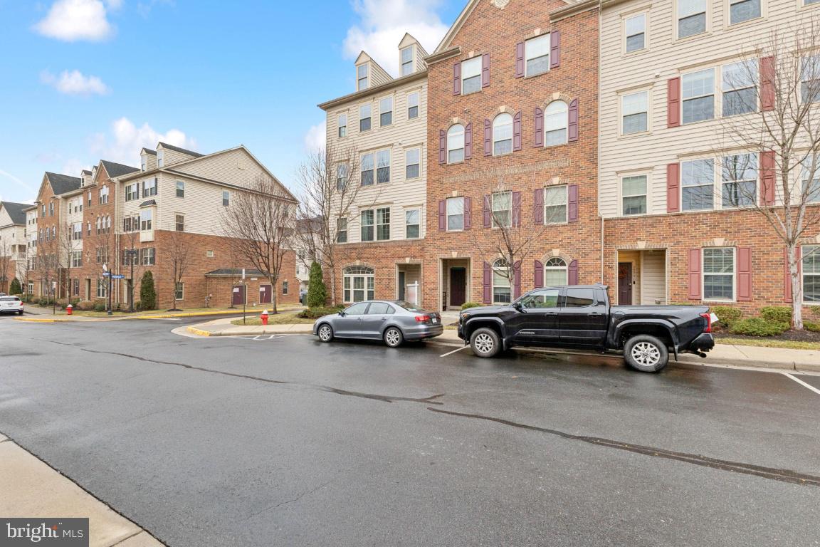 Beautifully maintained end-unit condo in the highly sought-after Virginia Manor section of Dulles Farms. This light-filled home offers the perfect blend of comfort, style, and convenience in one of the area’s most desirable communities.The main living area features a classic, open layout with rich wood flooring and a spacious living room that flows seamlessly into a well-appointed kitchen complete with granite countertops, a center island, and upgraded cabinetry—ideal for both everyday living and entertaining.Upstairs, you’ll find three generously sized bedrooms, two full bathrooms, and a convenient half bath. The home is enhanced with thoughtful upgrades throughout, including custom lighting, built-in speakers, and detailed tile work that adds a refined touch.Enjoy your own private terrace—perfect for morning coffee or unwinding in the evening.Residents of Dulles Farms enjoy access to exceptional amenities including clubhouses, fitness centers, swimming pools, tennis courts, tot lots, and miles of scenic walking trails—all within a welcoming, well-maintained community.With a recent price improvement to $559,990, this is an outstanding opportunity you don’t want to miss.