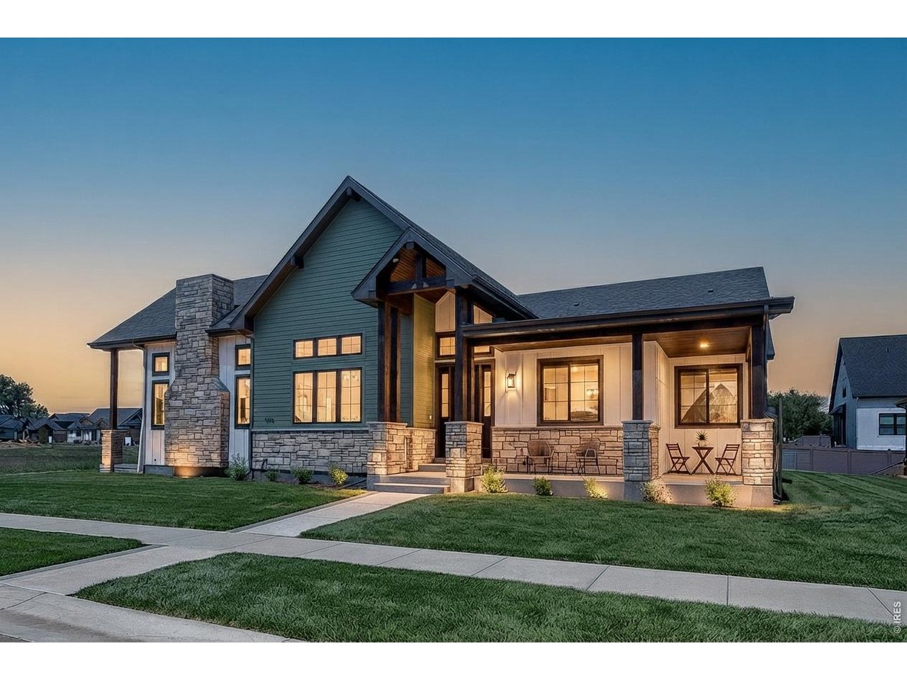 **This home was featured in the 2026 Parade of Homes**. Mountain Views Two Main-Floor Bedrooms + Office 920 SqFt Covered Outdoor Space Next Gen Multigenerational Basement NO METRO TAXExperience luxury Colorado living in this new construction ranch-style home in Berthoud's desirable Harvest Ridge South w/ NO METRO TAX! Positioned to maximize breathtaking Front Range mountain views and unforgettable Colorado sunsets, this home was designed around indoor/outdoor living, flexibility, & functionality. Offering 4,065 finished square feet, this home features true main floor living: spacious primary suite, a second main-level bedroom, dedicated office, laundry, & an oversized 969 SqFt 3-car garage built for large trucks and SUVs.The open-concept living area showcases oversized windows, a dramatic floor-to-ceiling stone fireplace, and a 3-panel sliding glass door to the tucked away patio. The chef-inspired kitchen includes a massive island, walk-in pantry, grocery door, gas range with hood, and generous dining space.Indoor/outdoor living is delivered, not just promised: 920 square feet of covered outdoor space across a covered front porch, two covered patios, and a private upper deck, each sited for the views.The primary suite is a private retreat wi/ direct patio access ideal for a future hot tub, oversized walk-in closet, and spa-inspired steam tub/shower combo. The main-floor office offers a closet and egress should a future owner want it as a bedroom. Upstairs is a private suite all its own: a 15x15 bedroom with mountain views, walk-in closet, full bath, and its own covered deck, ideal for guests, extended family, or a teen retreat.The independently accessible finished basement has its own garage entrance and two additional bedrooms, embracing the sought-after "Next Gen" multigenerational concept: extended family, gym, media room, or flexible living. Designer finishes throughout. Near parks, trails, and Northern Colorado amenities.