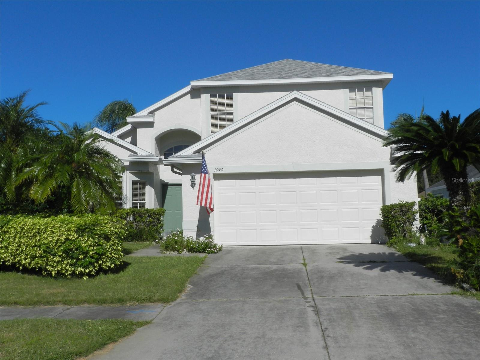 Desirable 4 bedroom pool home, 2 car garage in Scotsdale Bluffs.  Located close to Downtown Denedin and the Pinellas Trail. All Dunedin Schools. Luxury vinal on the first floor.  Centrally located kitchen with shaker style cabinets stainless steel appliances, recessed lighting, vaulted ceiling and breakfast bar.  Breakfast area adjoins the kitchen with sloding glass door to the covered porch and open pool. There is a formal dining room with a bow window and vaulted ceiling.  This home offers a large primary bedroom on the 1st floor with 9' ceilings and band an en-suite bath  wth a double vanity, soakig  tub, seperate walk in shower and  walk in closet.  5 1/4 baseboard throughout.  The living room has vaulted ceings and overloks the pool. There is a half bath and a laundry closet with a full size washer and dryer.  There are 3 spacious bedrooms with 9 foot ceilings and a full bath on the second floor. There is carpeting throughout the 2nd floor.  Interior and exterior recently painted. A/C replaced September 2022, fully fenced yard.  Irrigation system on reclaimed water.All room dimentions are estimated and buyer should measure the rooms for the exact size and verify all printed material.