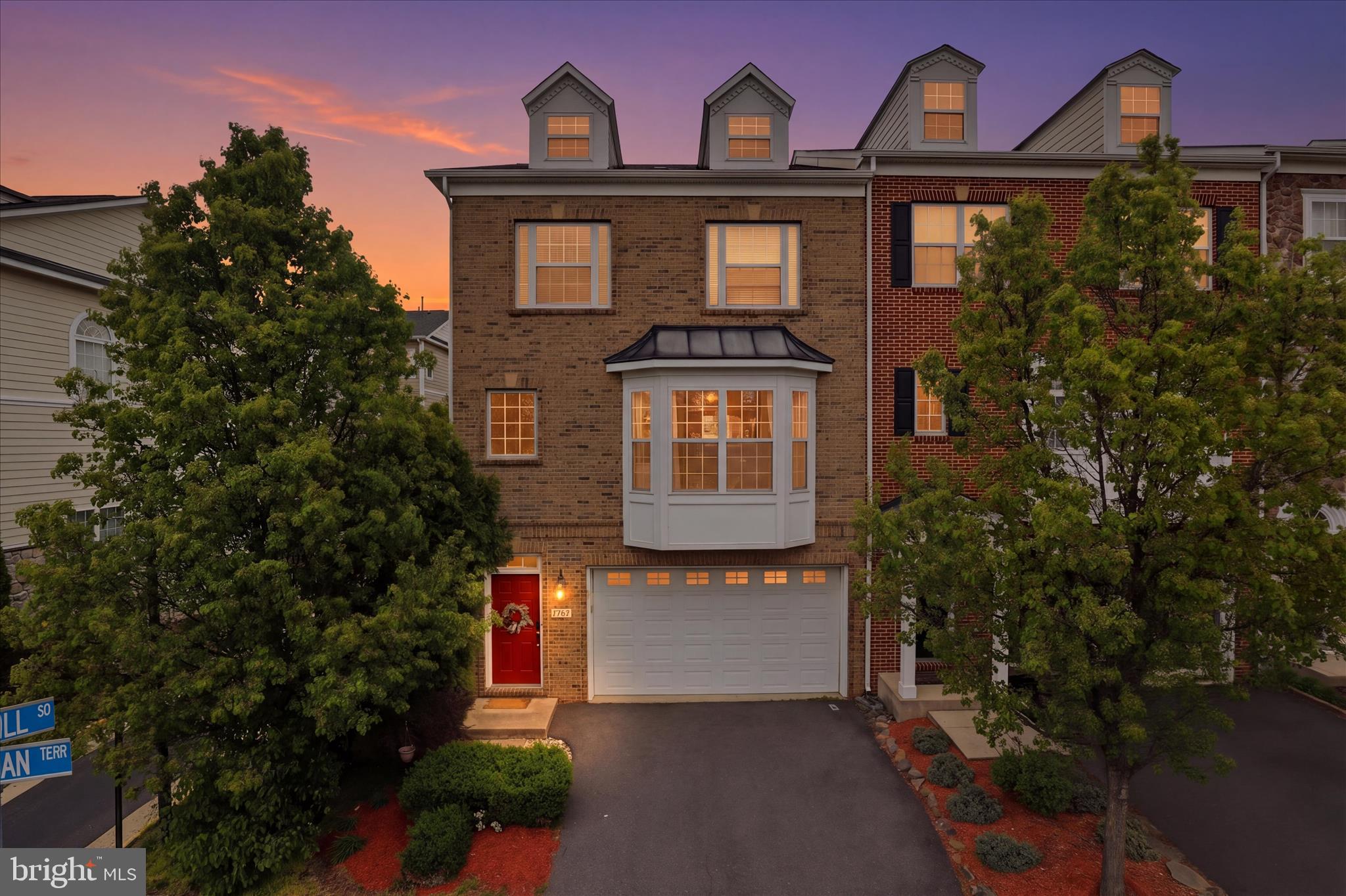 **LOCATED IN A DESIRABLE NEIGHBORHOOD, THIS LOVELY END UNIT TOWN-HOME IS SITUATED IN A GREAT COMMUNITY! ENJOY WALKS TO THE LOVELY PREMIERE LIFESTYLE SHOPPING CENTER FEATURING MORE THAN 30 RETAILERS FOR SHOPPING, DINING AND LIFESTYLE AMENITIES. BIKE PATHS AND WALKING TRAILS SURROUND THE COMMUNITY AS WELL ADDING LOTS OF OPTIONS FOR YOU DAYS AND EVENINGS.  INSIDE THIS HOME IS FANTASTIC AND FEATURE 4 BR'S AND LOTS OF SPACE FOR GROWING. THE UPPER LEVEL HOST 3 BR'S INCLUDING A SPACIOUS PRIMARY BR W/ A WALK IN CLOSET.  INCLUDED ON THE 1ST FLOOR IS A OPEN FLOOR PLAN WITH A FANTASTIC KITCHEN, OPEN LIVING & DINING ROOM WITH GLEAMING HARDWOOD FLOORS.  THE LOWER LEVEL BOAST A 4TH BR WITH A FIREPLACE AND A FULL BATH. WELCOME HOME**