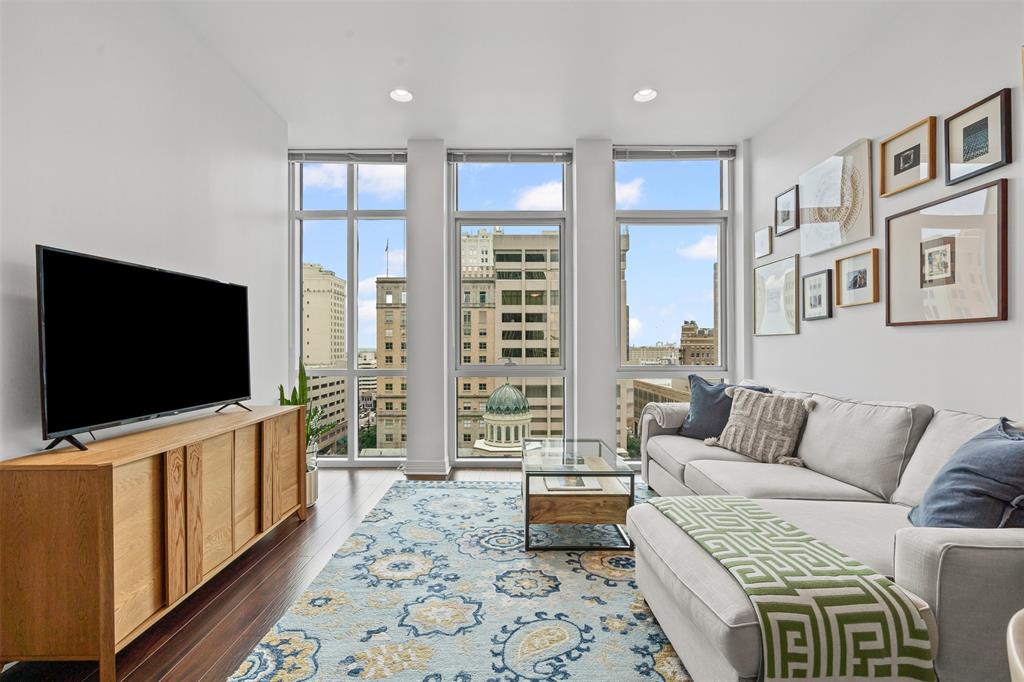 Stunning condo in the center of downtown Fort Worth at the Tower! This 1-1 with large living features wood floors, stacked washer and dryer in utility, stainless steel appliances in kitchen, floor to ceiling windows with great views of the pool area and the city.  The Tower amenities include outdoor pool area, firepit area, dining terrace, grills, party room, fitness center and guest suites.  24 hr Concierge at front desk. Fob Secured Entry. Walk to Work, Entertainment and dining! Trinity Trails are just blocks away.  Enjoy year round downtown events. Great Location.  All utilities and high speed internet to be paid separately to owner at $125.00 per month. NO PETS Allowed for Tower Tenants