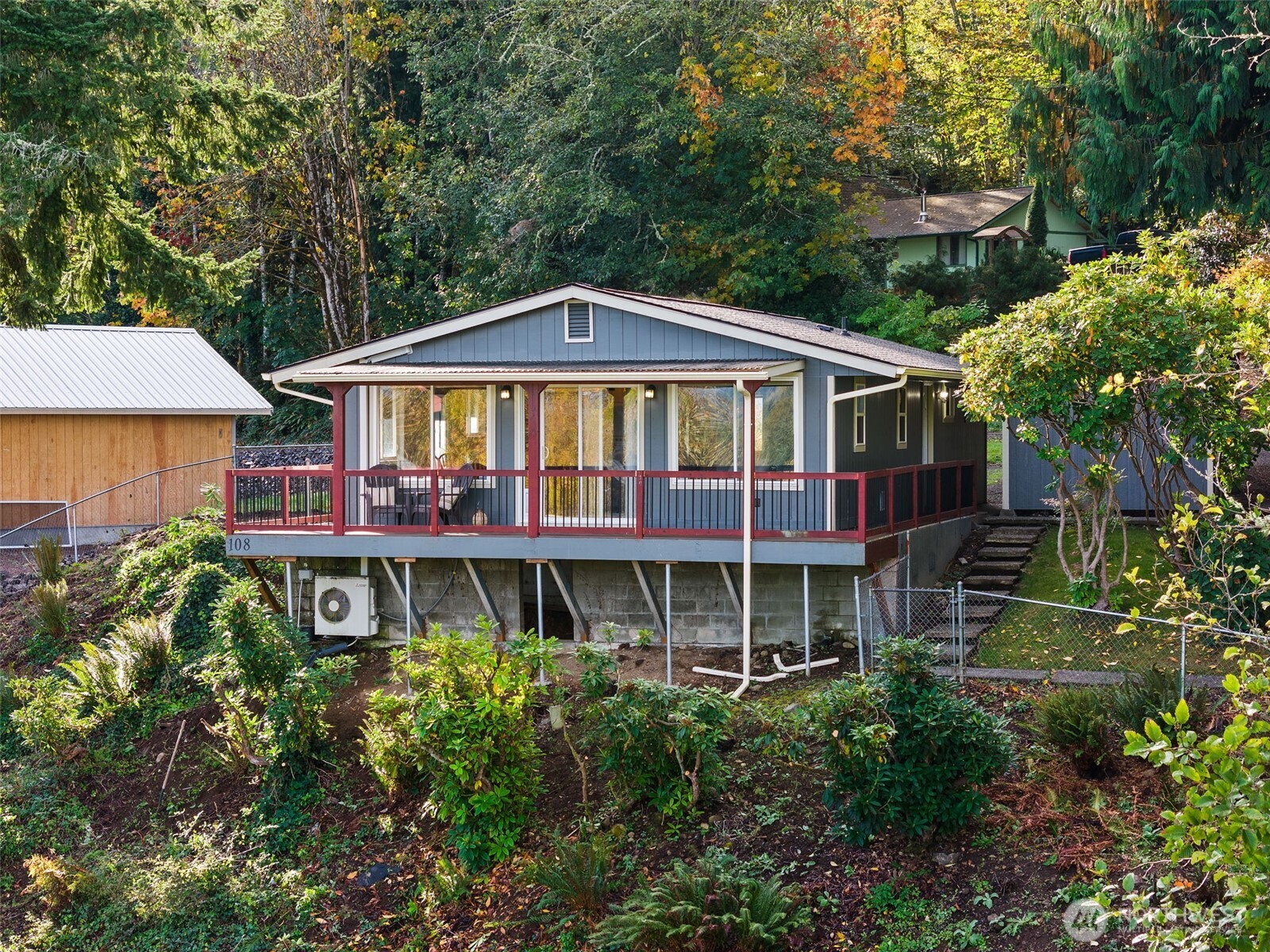 Experience lakeside living in this beautifully updated 2-bedroom home set on two parcels totaling 22,652 sq ft in a desirable Mayfield Lake neighborhood. Enjoy a new roof, spa-inspired walk-in shower with dual shower heads, and a 2-year-old in-ceiling heat pump for year-round comfort. The bright open-concept kitchen and living area flows seamlessly to a private deck, perfect for entertaining. Outdoors features a 12x16 shed, portable greenhouse, 10x20 carport, and ample space for your RV or boat. Just minutes from Mayfield Lake Marina—ideal as a vacation getaway, short-term rental, or full-time home with endless possibilities. Potential to purchase marina membership with boat slip.