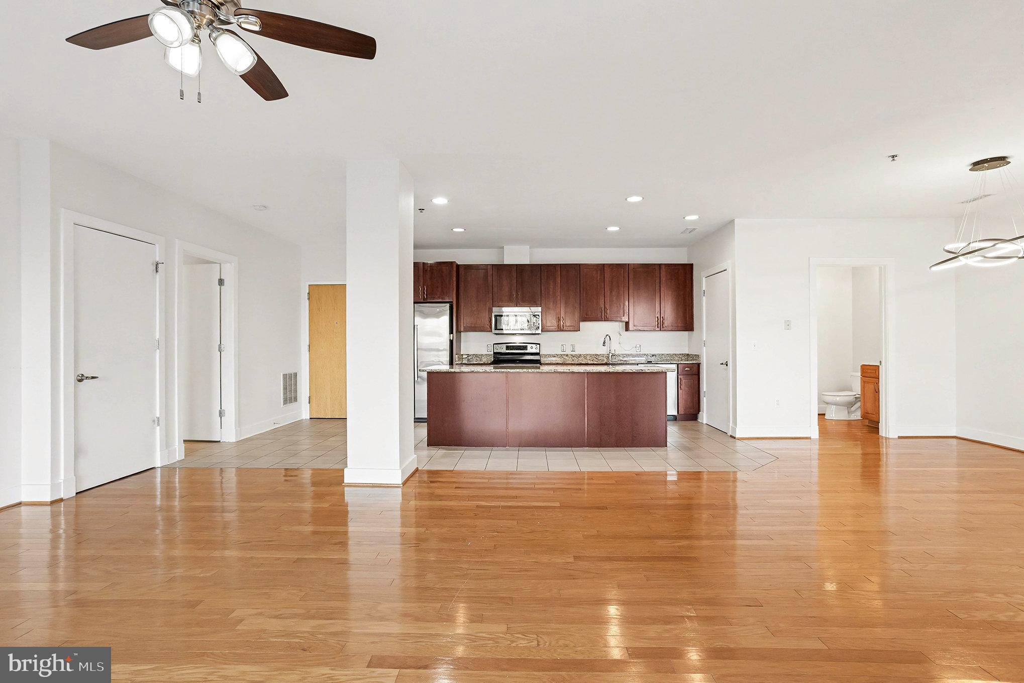 Welcome home to this beautifully maintained condo offering comfort, convenience, and low-maintenance living. This light-filled unit features an open floor plan with spacious living and dining areas, perfect for everyday living and entertaining. The well-appointed kitchen provides ample cabinet space and flows seamlessly into the main living area.The generously sized bedrooms offer plenty of closet space, while the updated bathrooms add a modern touch. Enjoy the convenience of in-unit laundry, assigned parking, and additional storage. The community offers professionally managed grounds and easy access to shopping, dining, and major commuter routes.Whether you’re a first-time buyer, downsizer, or investor, this condo presents an excellent opportunity for comfortable living in a desirable location.