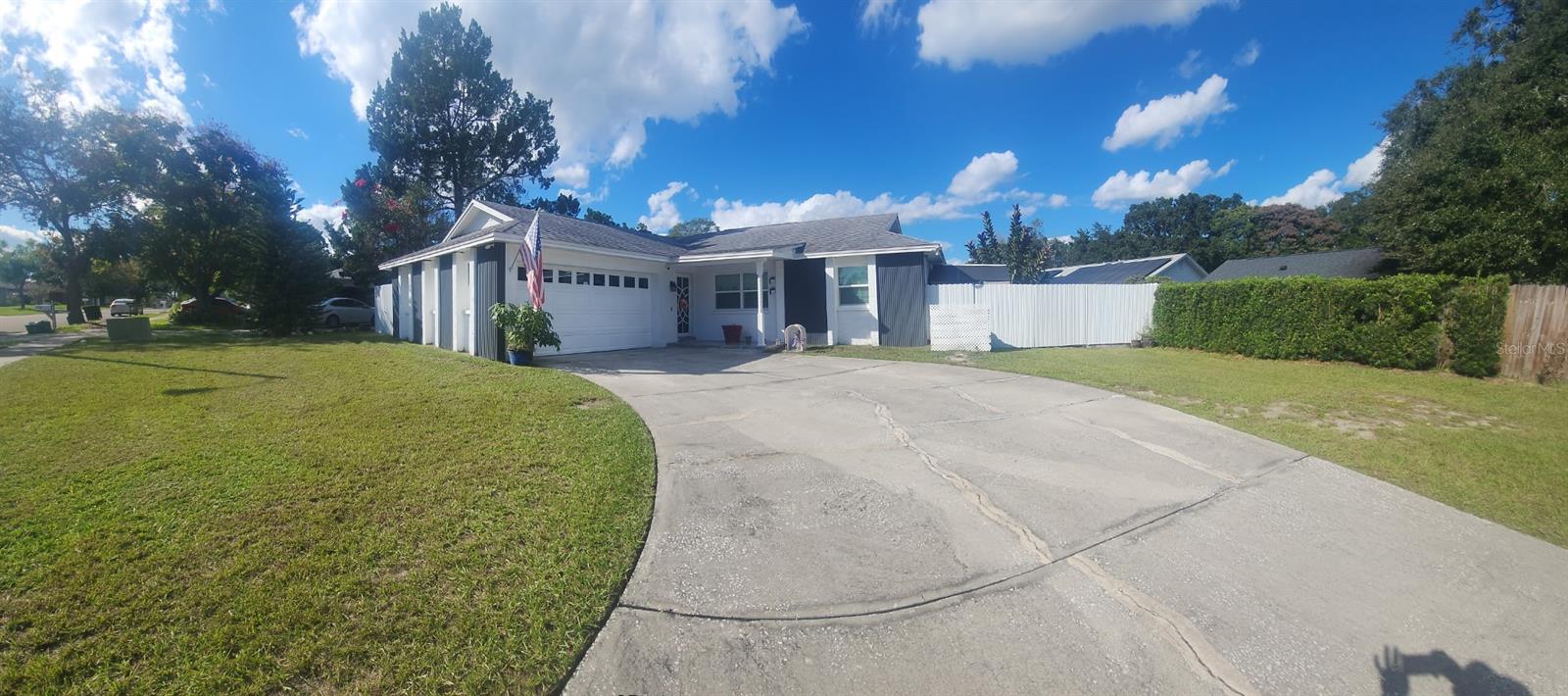 What a dream to find a small home with a luxurious finish level and a pool that's dressed to impress.  Homeowners spared no expense in renovating this well built 1970s ranch home.  It is brand new inside and out with over 100k in updates.  This home features Ring doorbell and keyless entry with state of the art camera surveillance system, Smart thermostat, Rinnai tankless water heater and more.  New 24' porcelain tile throughout.  You can enjoy an open plan with Shaker style kitchen cabinets, granite countertops, top of the line Samsung appliances with a Smart gas oven and separate bar area with wine fridge.  Master and second bedrooms are split, each with a walk-in closet and bathroom.  Both bathrooms have been totally redone.    Home has all new impact resistant windows and doors throughout.  New french doors  off the kitchen lead to an outdoor Oasis with plenty of room to entertain with large screen TV in place.  Backyard  has new Aluminum fencing all around, patio and pool have new sealed pavers throughout, Salt water pool has lights and jetted area to relax. The outdoor kitchen has small fridge, ice machine for cold outdoor drinks, 2 burner stovetop, sink.  Dont forget about your outdoor shower with both hot and cold running water also.  Home has newer roof,  Rheem A/C, new ductwork, new  plumbing, breaker box pre-wired for whole home generator, propane gas system recently filled pre-paid and transferrable, and water filtration system. Come see your new home!  Sellers have done all the hard work so you dont have to.